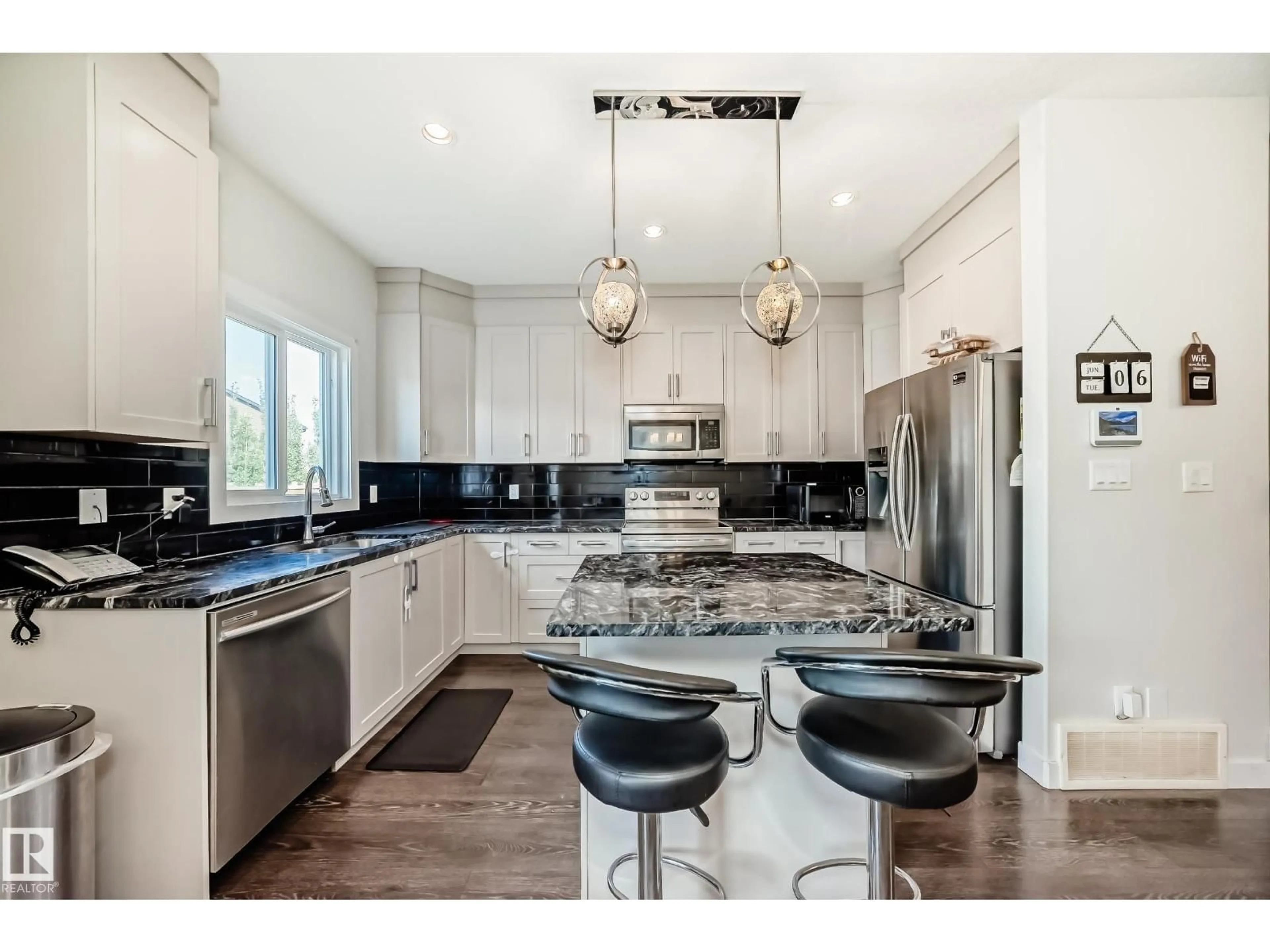 Open concept kitchen, ceramic/tile floor for 7430 CREIGHTON PL, Edmonton Alberta T6W3Z4