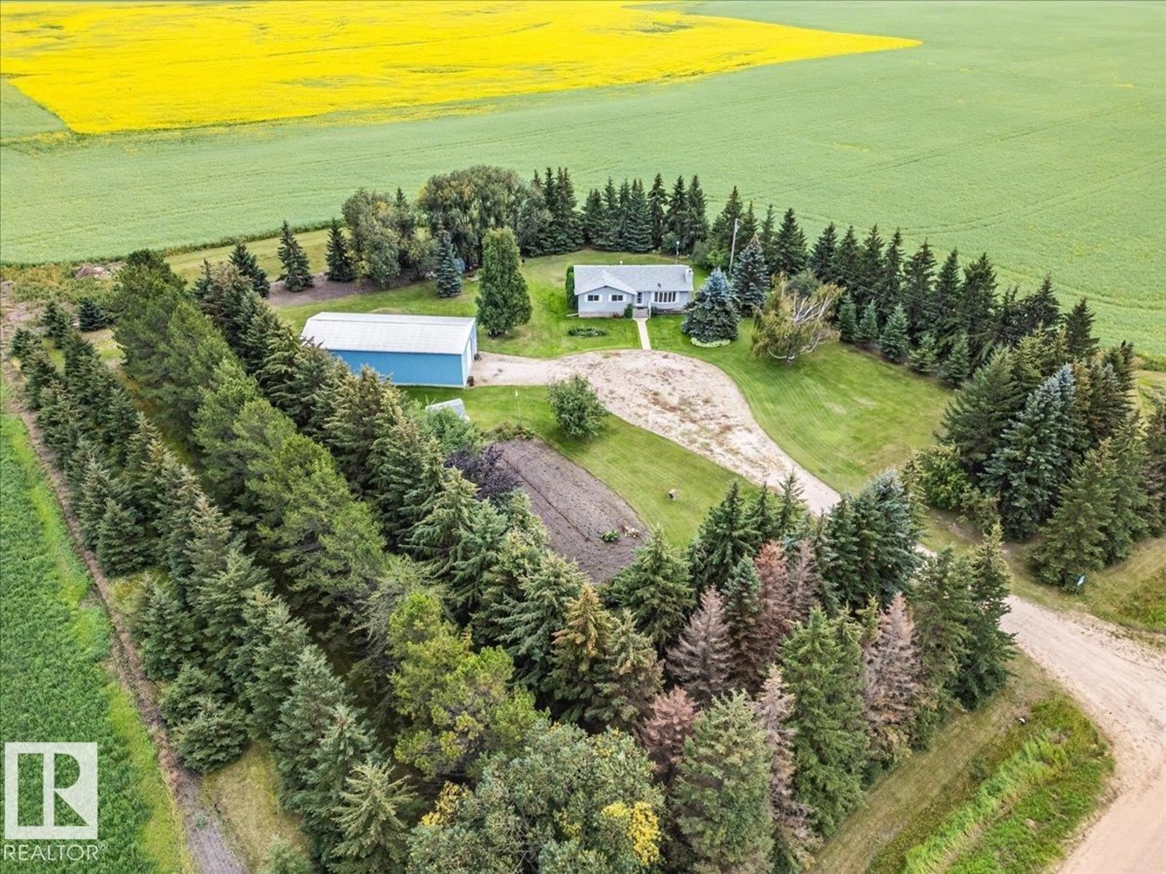 A pic from outside/outdoor area/front of a property/back of a property/a pic from drone, unknown for 460077 RGE ROAD 253, Rural Wetaskiwin County Alberta T9A1X2