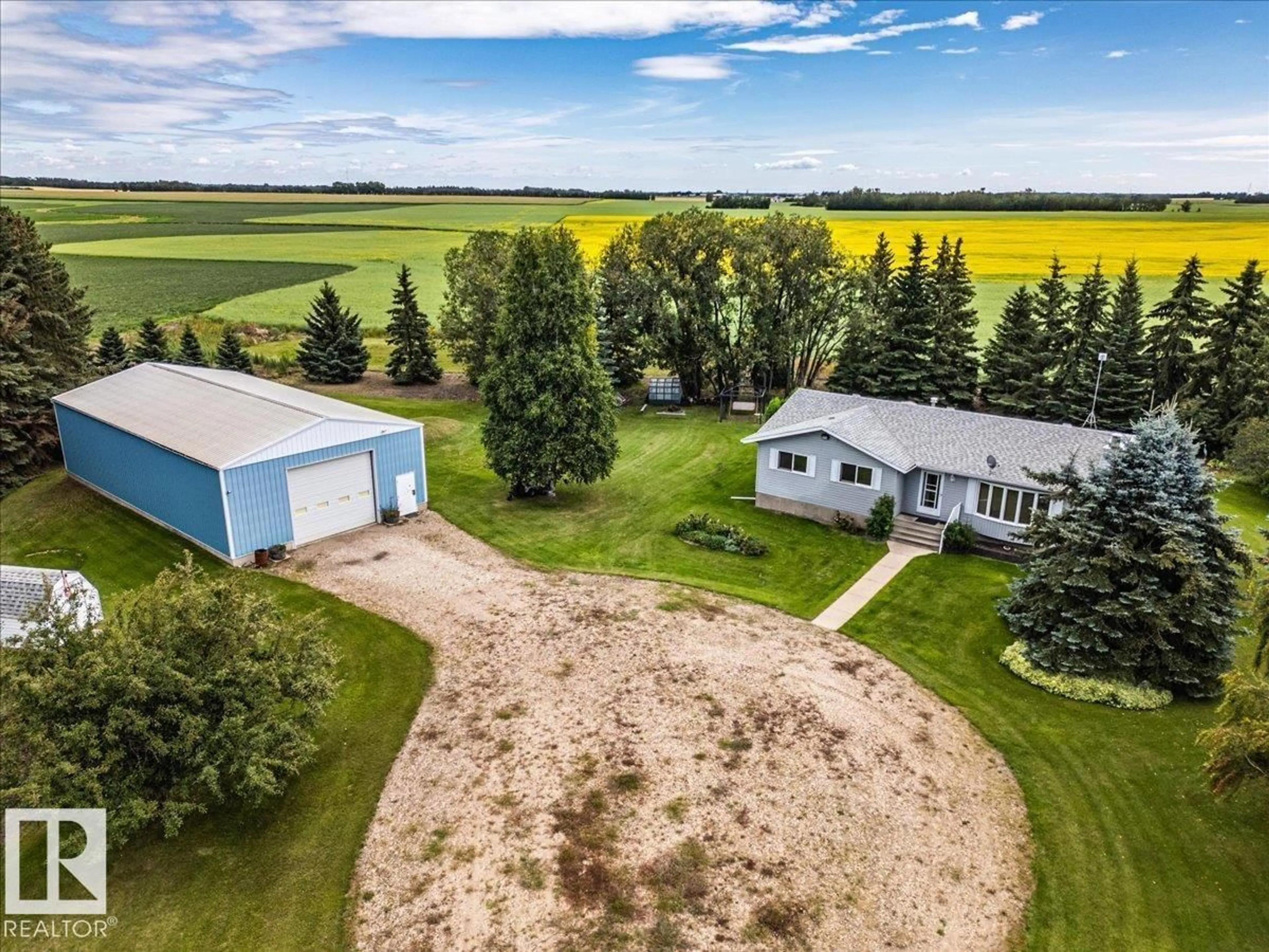 A pic from outside/outdoor area/front of a property/back of a property/a pic from drone, unknown for 460077 RGE ROAD 253, Rural Wetaskiwin County Alberta T9A1X2