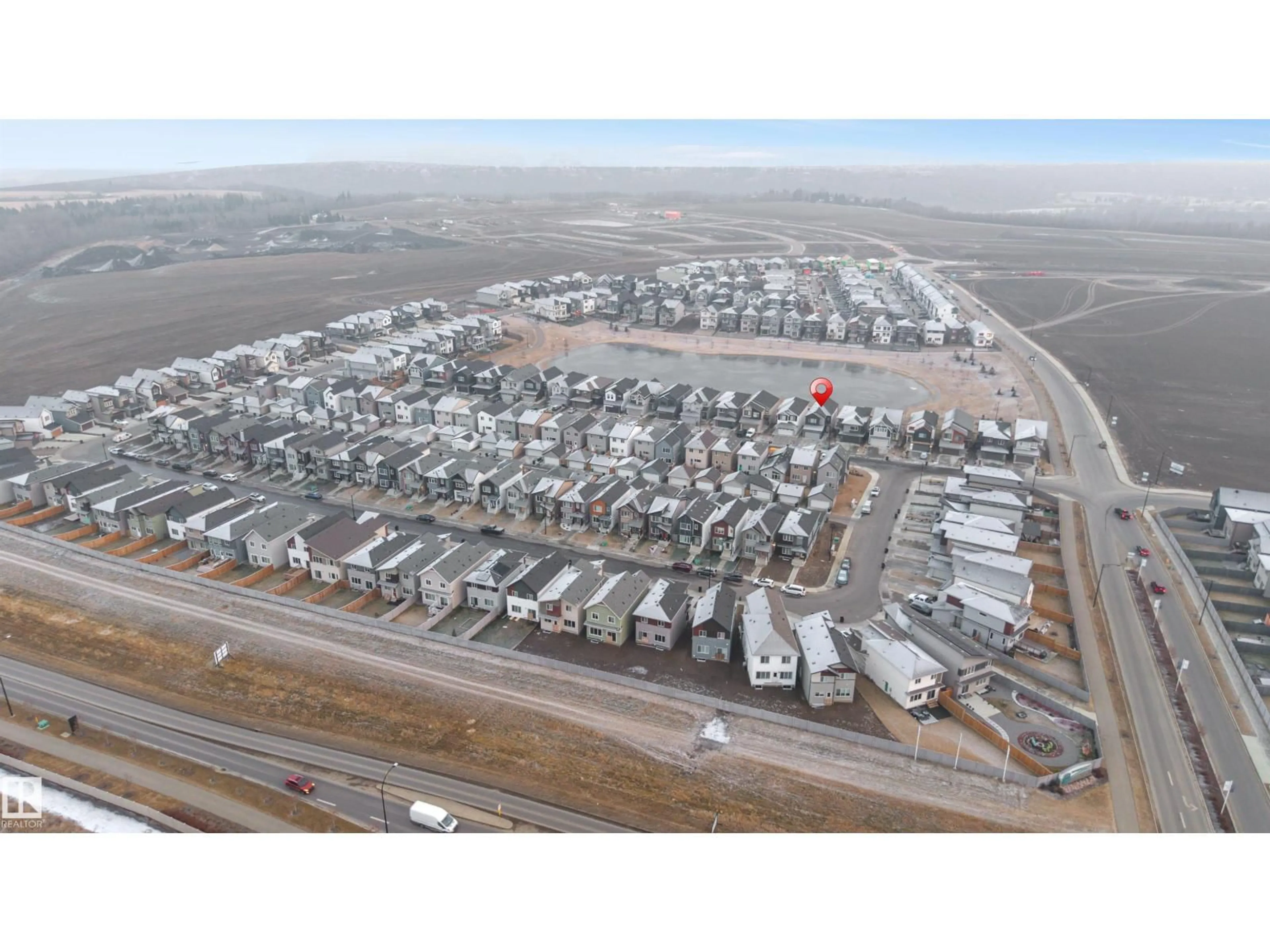 A pic from outside/outdoor area/front of a property/back of a property/a pic from drone, street for 19135 22 AV, Edmonton Alberta T6M1R1