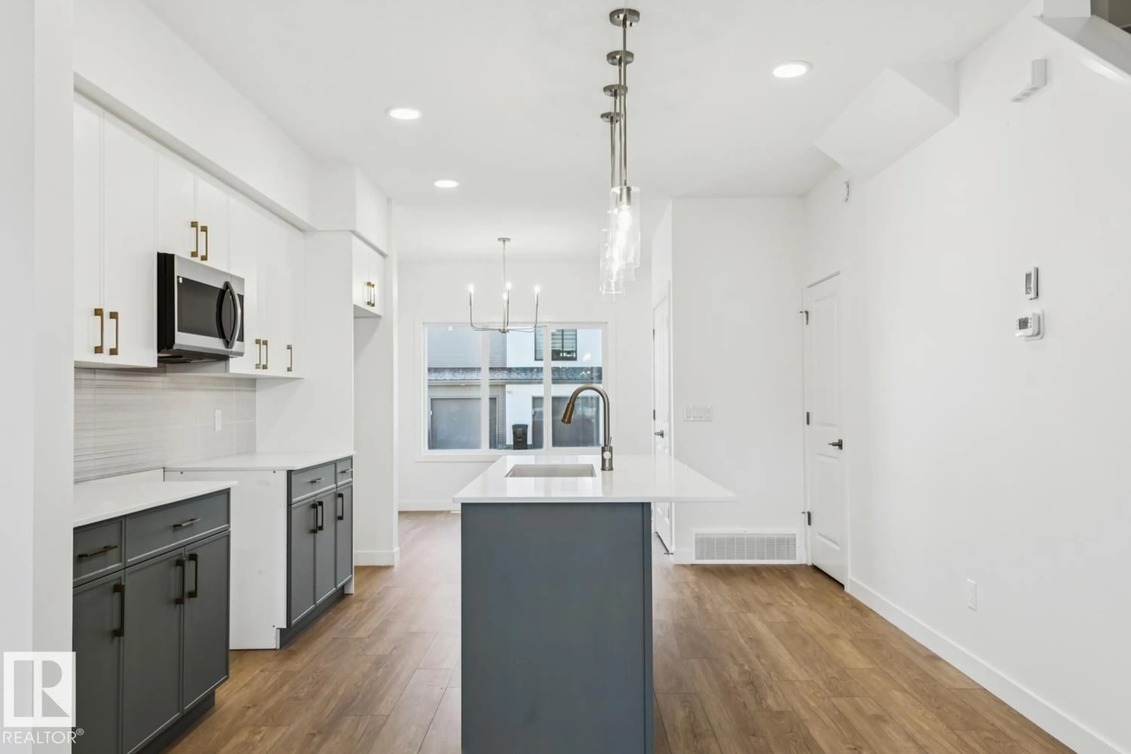 Open concept kitchen, unknown for NW - 6261 175A AV, Edmonton Alberta T5Y4A5