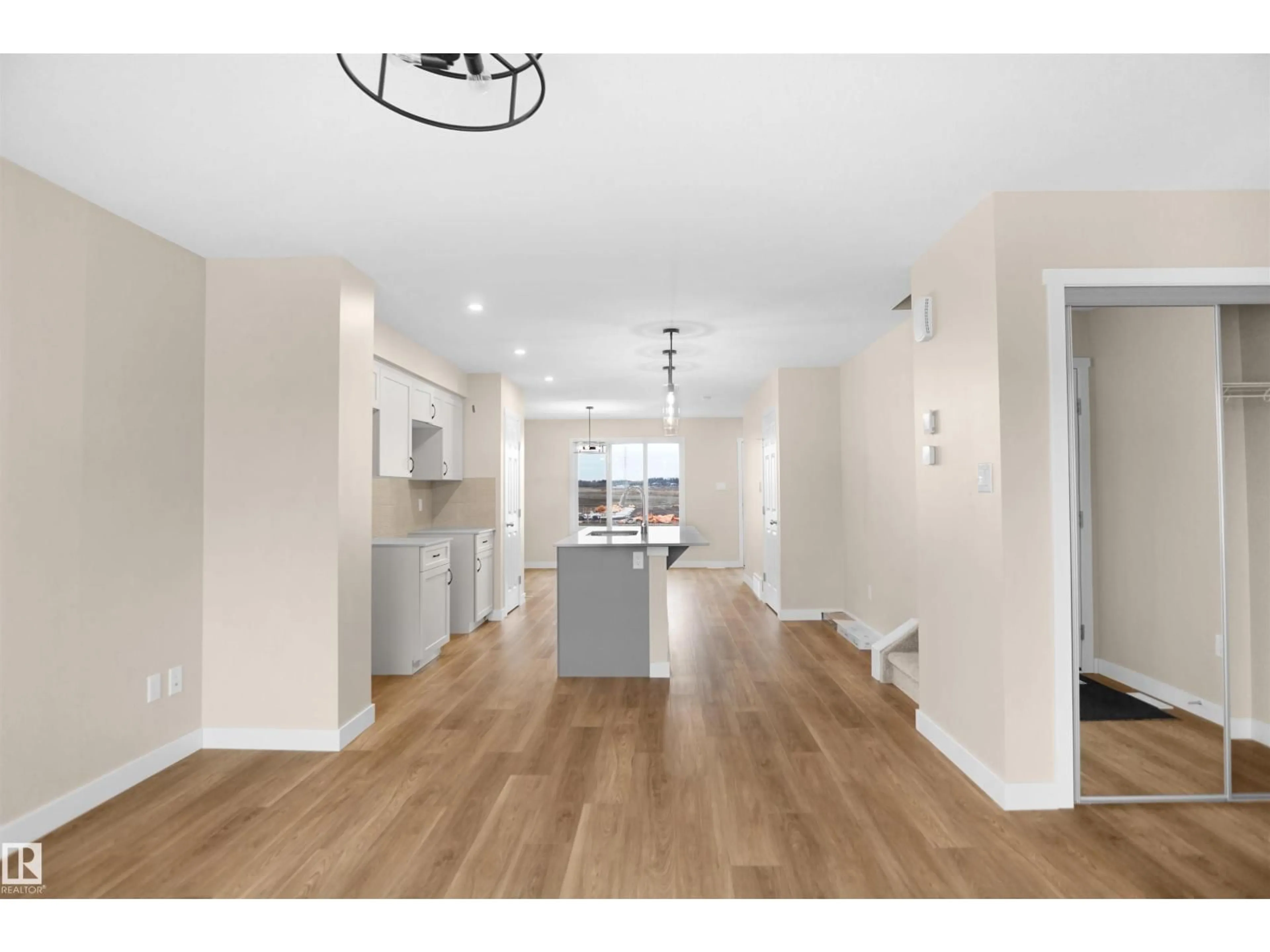 Open concept kitchen, wood/laminate floor for NE - 522 176 AV, Edmonton Alberta T5Y4G1