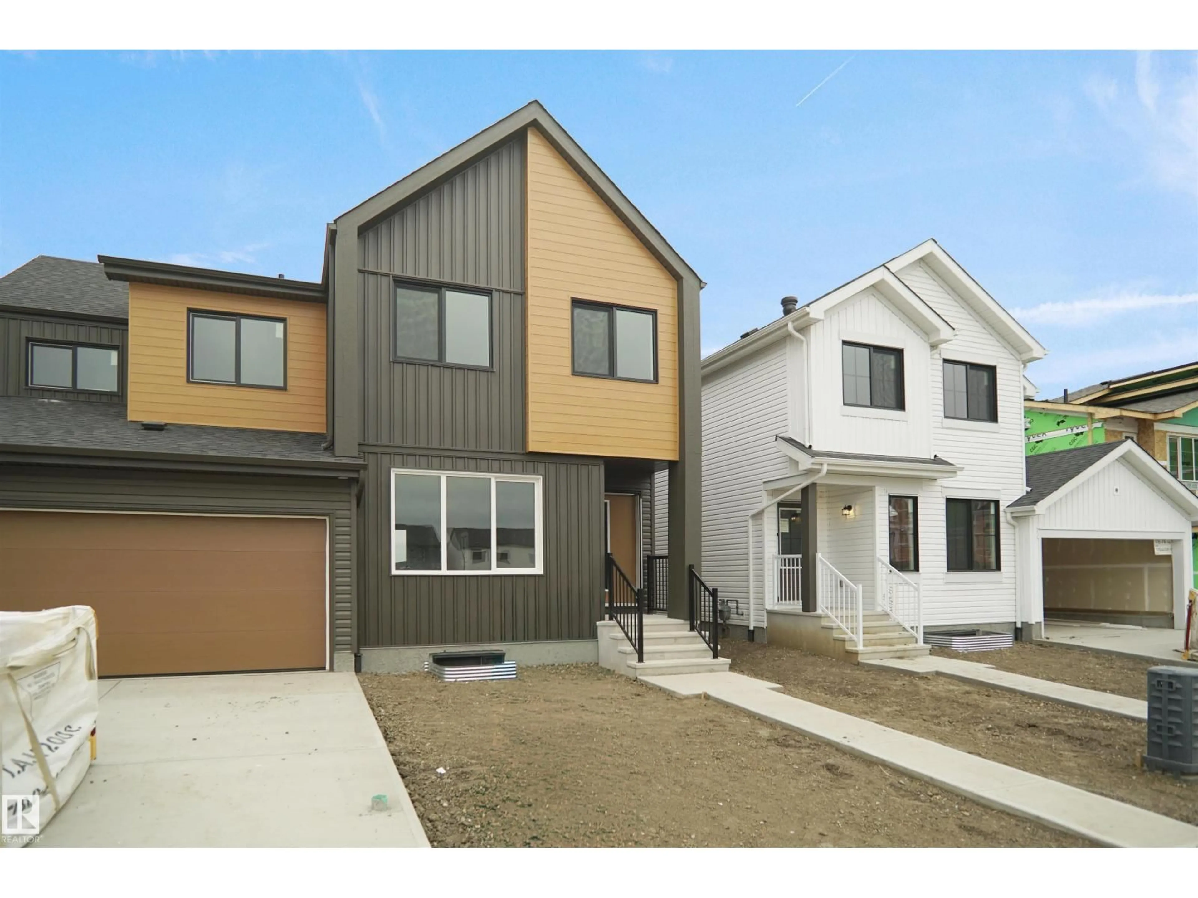 Home with vinyl exterior material, street for NE - 524 176 AV, Edmonton Alberta T5Y4G1
