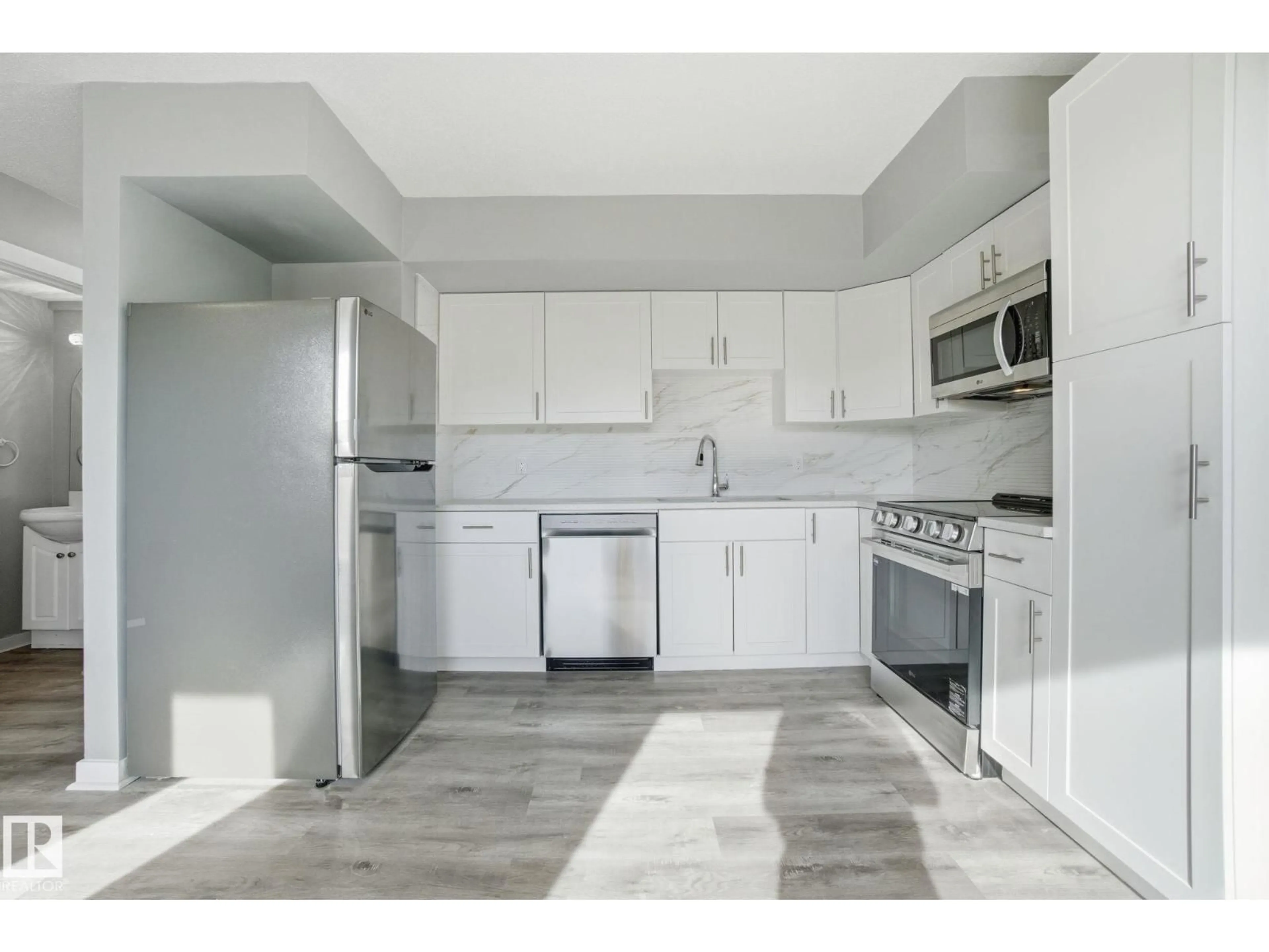 Standard kitchen, ceramic/tile floor for 8117 132A AV, Edmonton Alberta T5C2C9