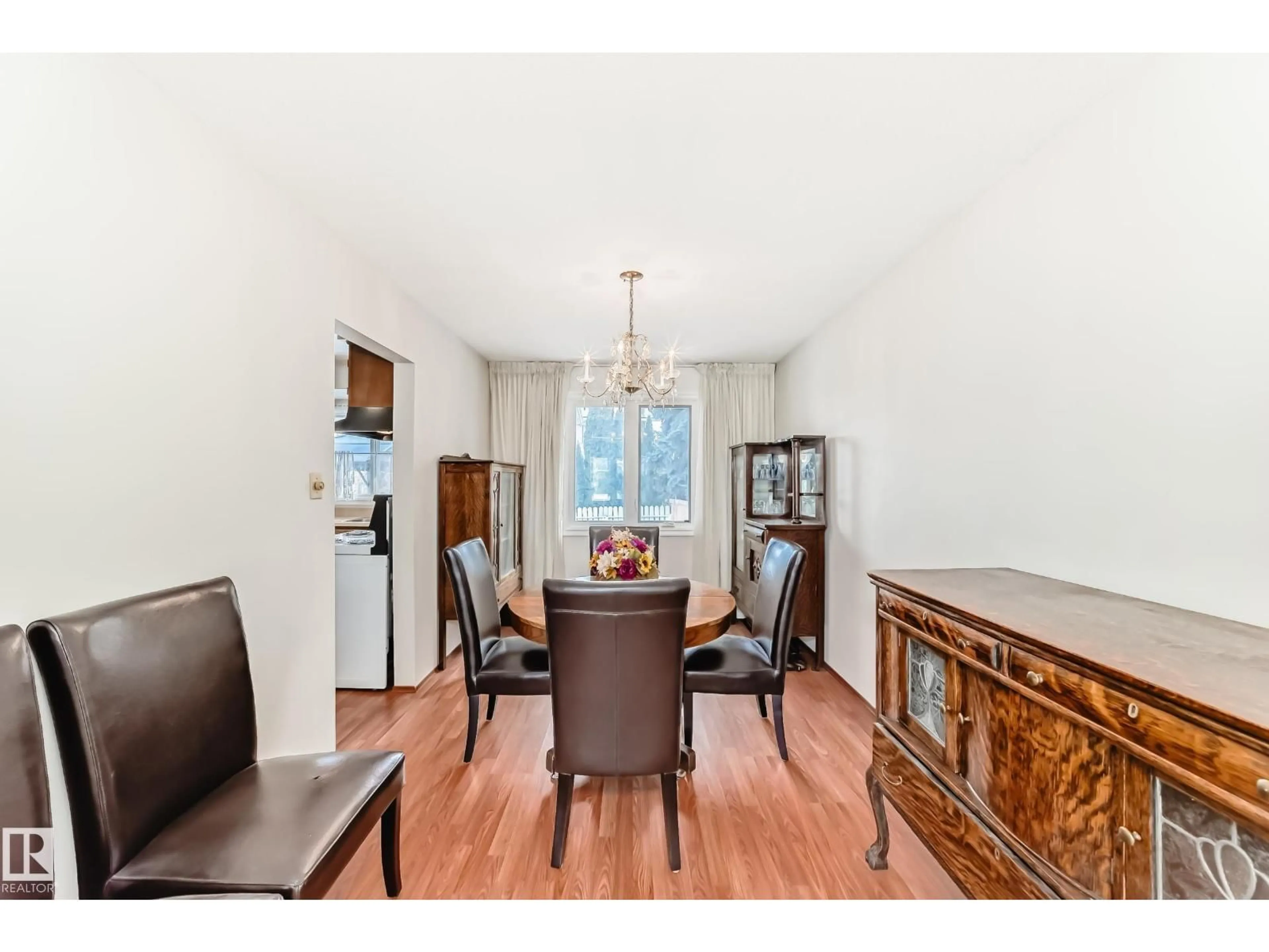 Dining room, wood/laminate floor for 4231 110 ST, Edmonton Alberta T6J2S9