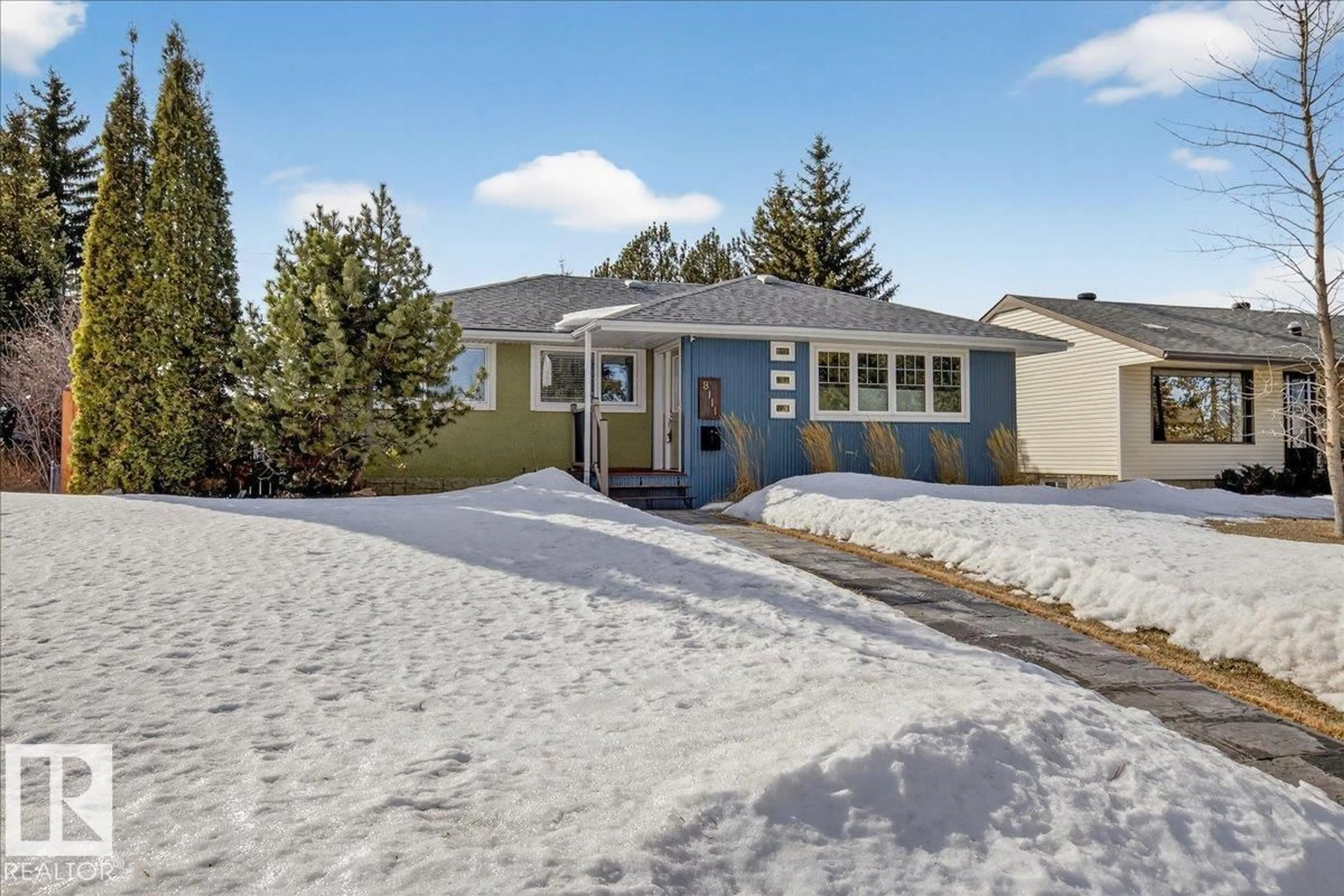 Home with vinyl exterior material, street for 8111 70 AV, Edmonton Alberta T6C0A6