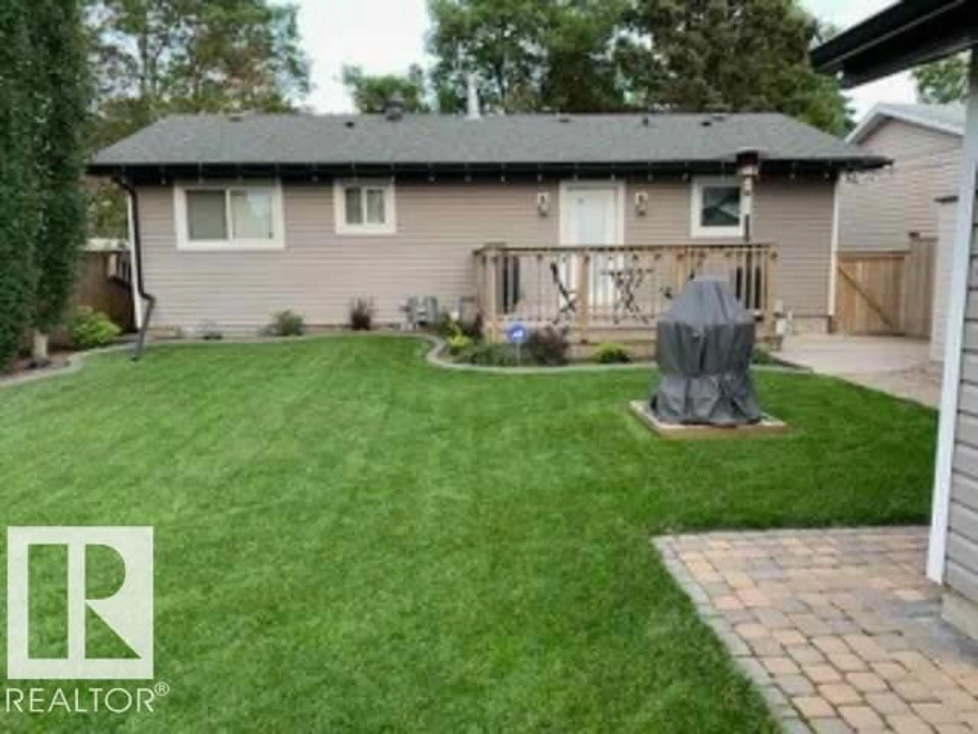 Home with vinyl exterior material, street for NW - 10454 166 ST, Edmonton Alberta T5P4C7
