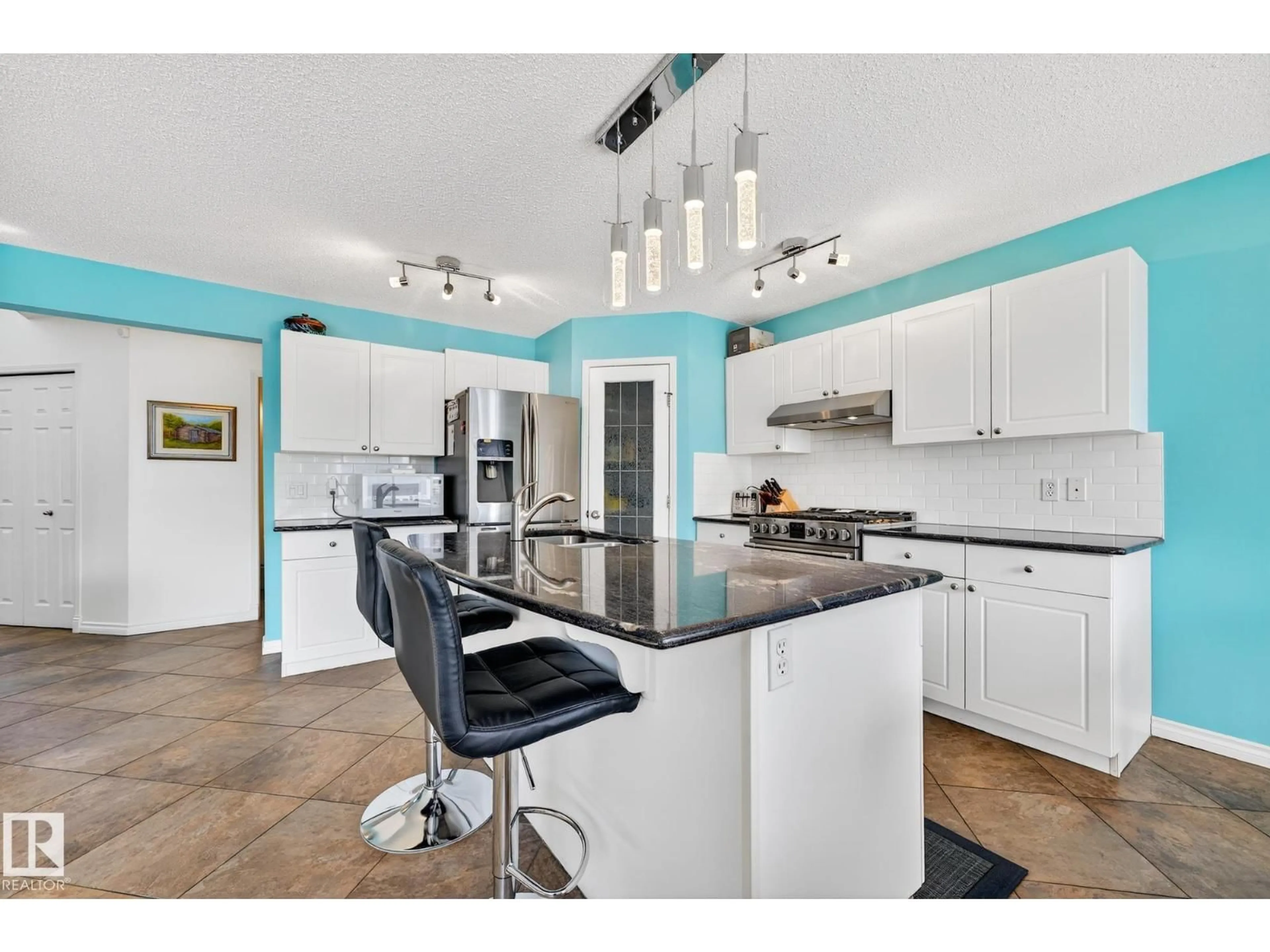 Open concept kitchen, unknown for 16004 91 ST, Edmonton Alberta T5Z3P4