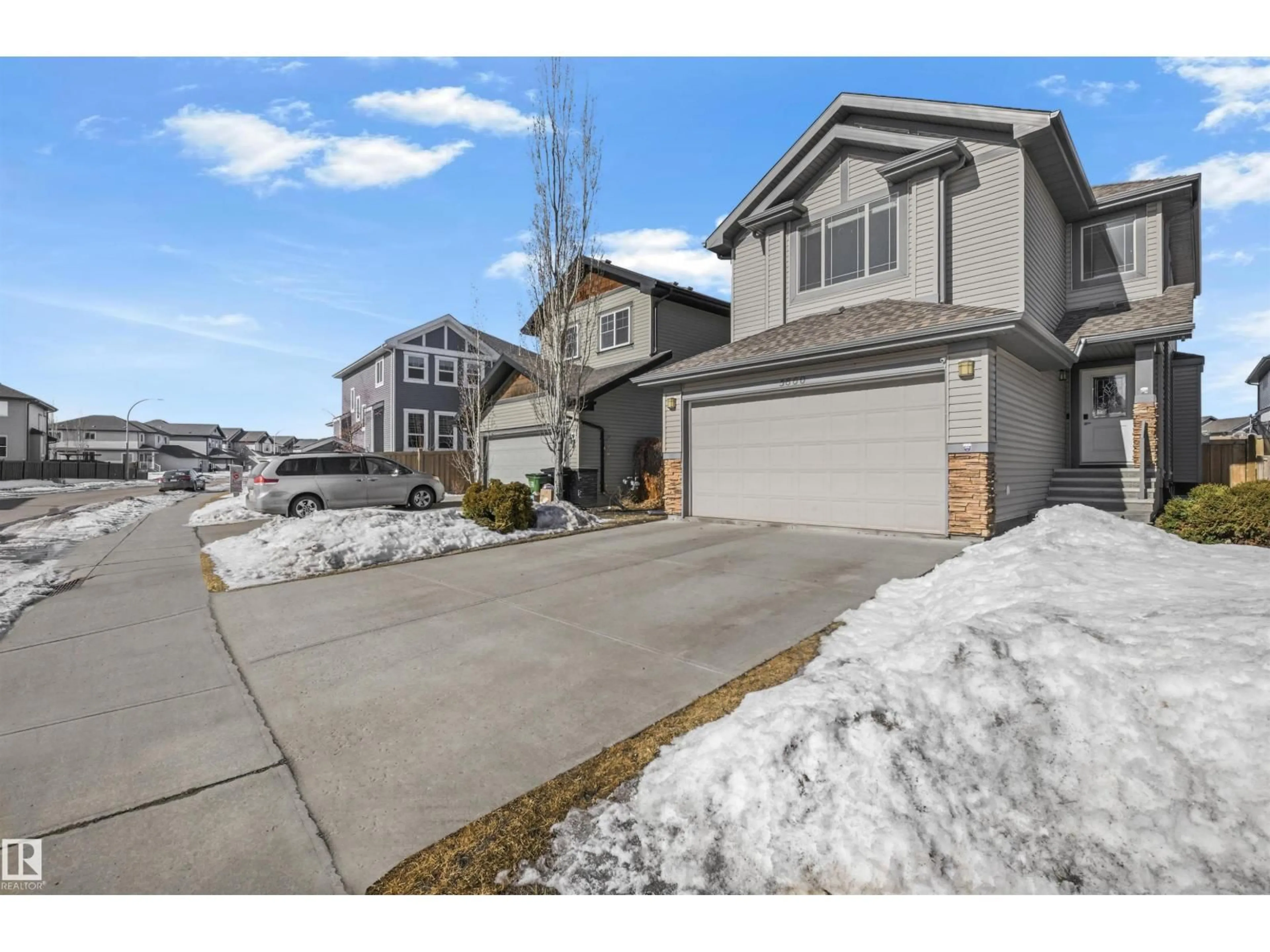 A pic from outside/outdoor area/front of a property/back of a property/a pic from drone, street for 5860 168 AV, Edmonton Alberta T5Y0N3