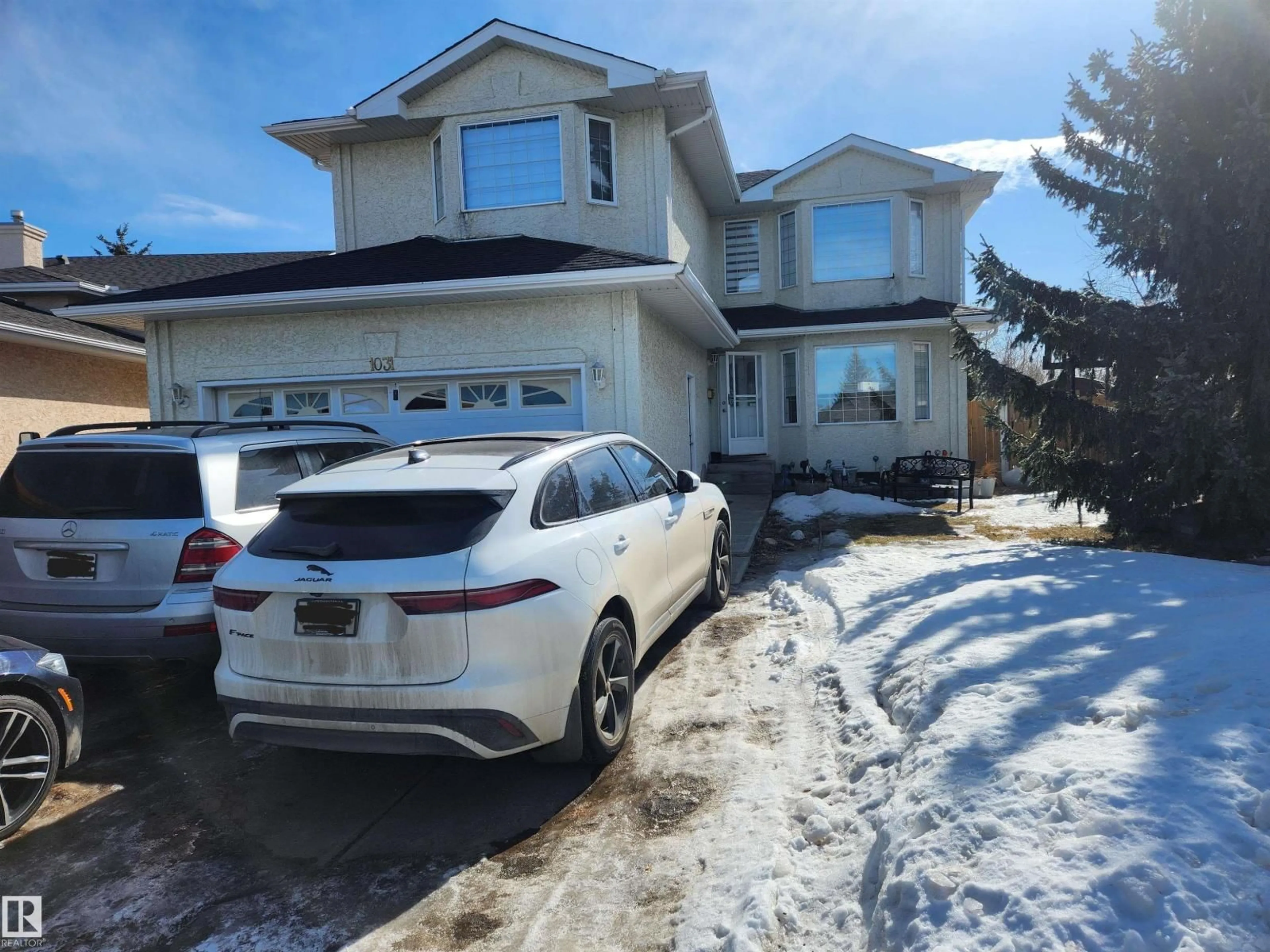 Home with vinyl exterior material, street for 1031 JONES CR, Edmonton Alberta T6L6Y2