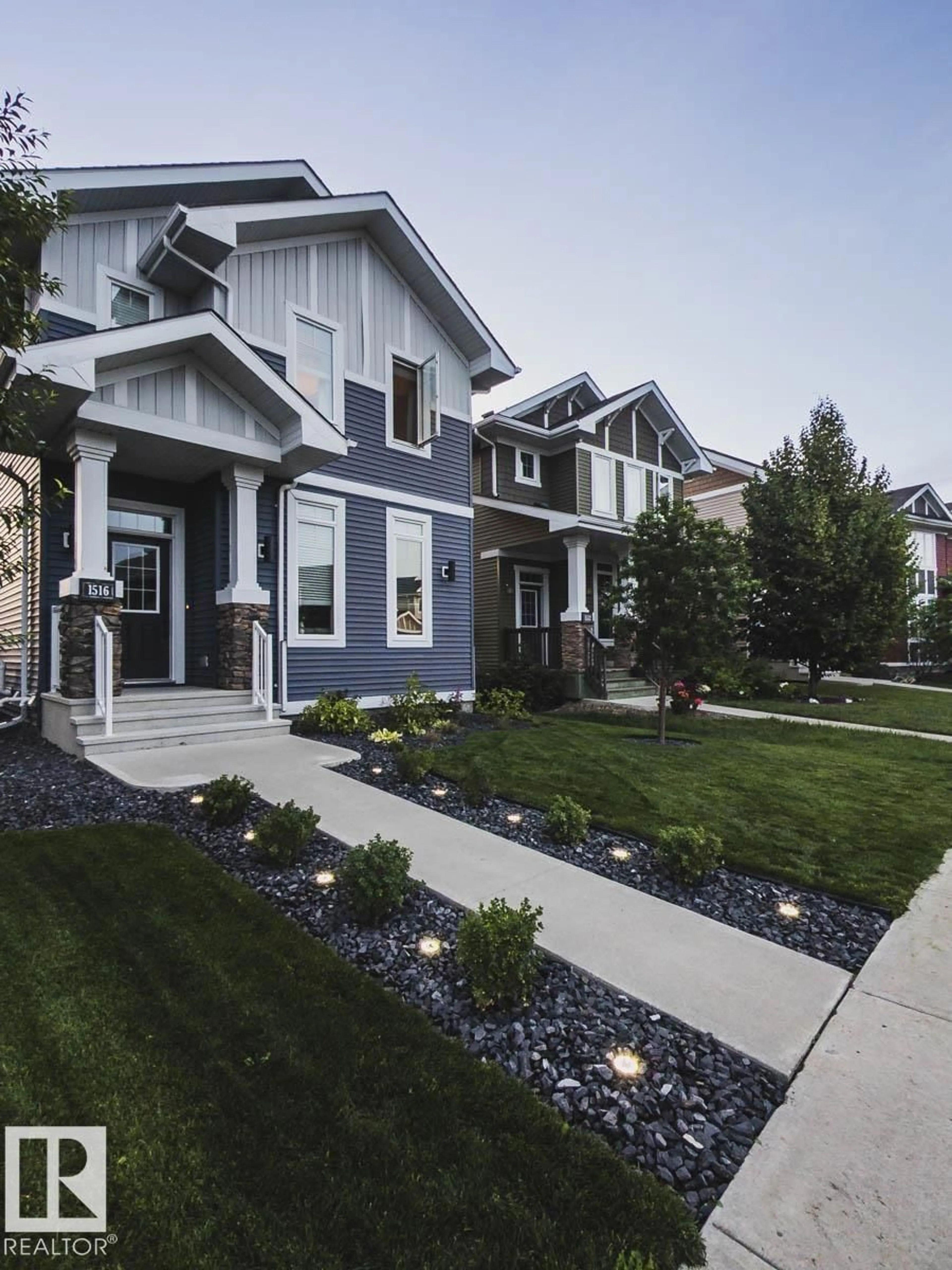 Home with vinyl exterior material, street for SW - 1516 165 ST, Edmonton Alberta T6W2Z7