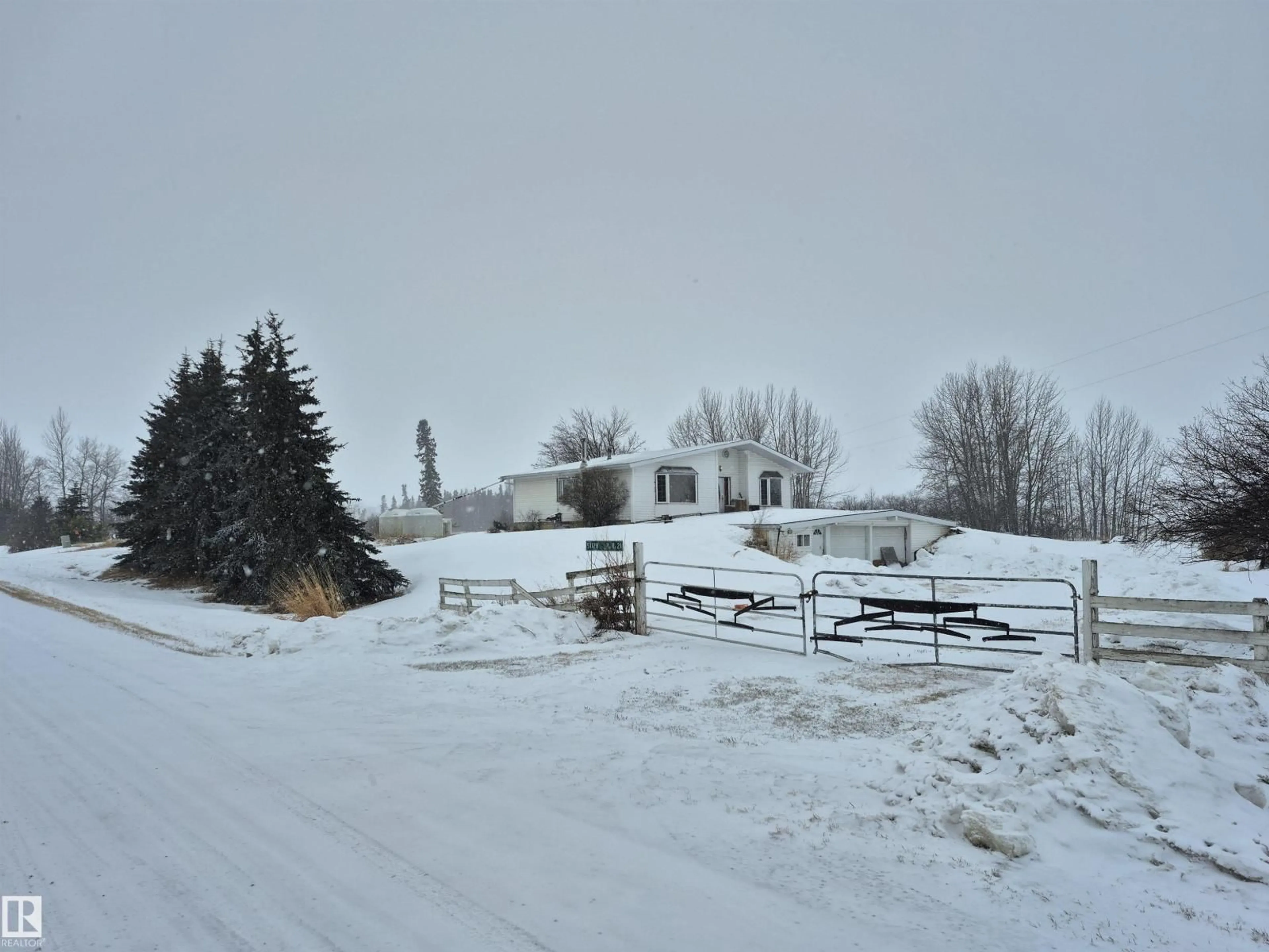 A pic from outside/outdoor area/front of a property/back of a property/a pic from drone, mountain view for 51128 RGE ROAD 21, Rural Parkland County Alberta T7Y2H6