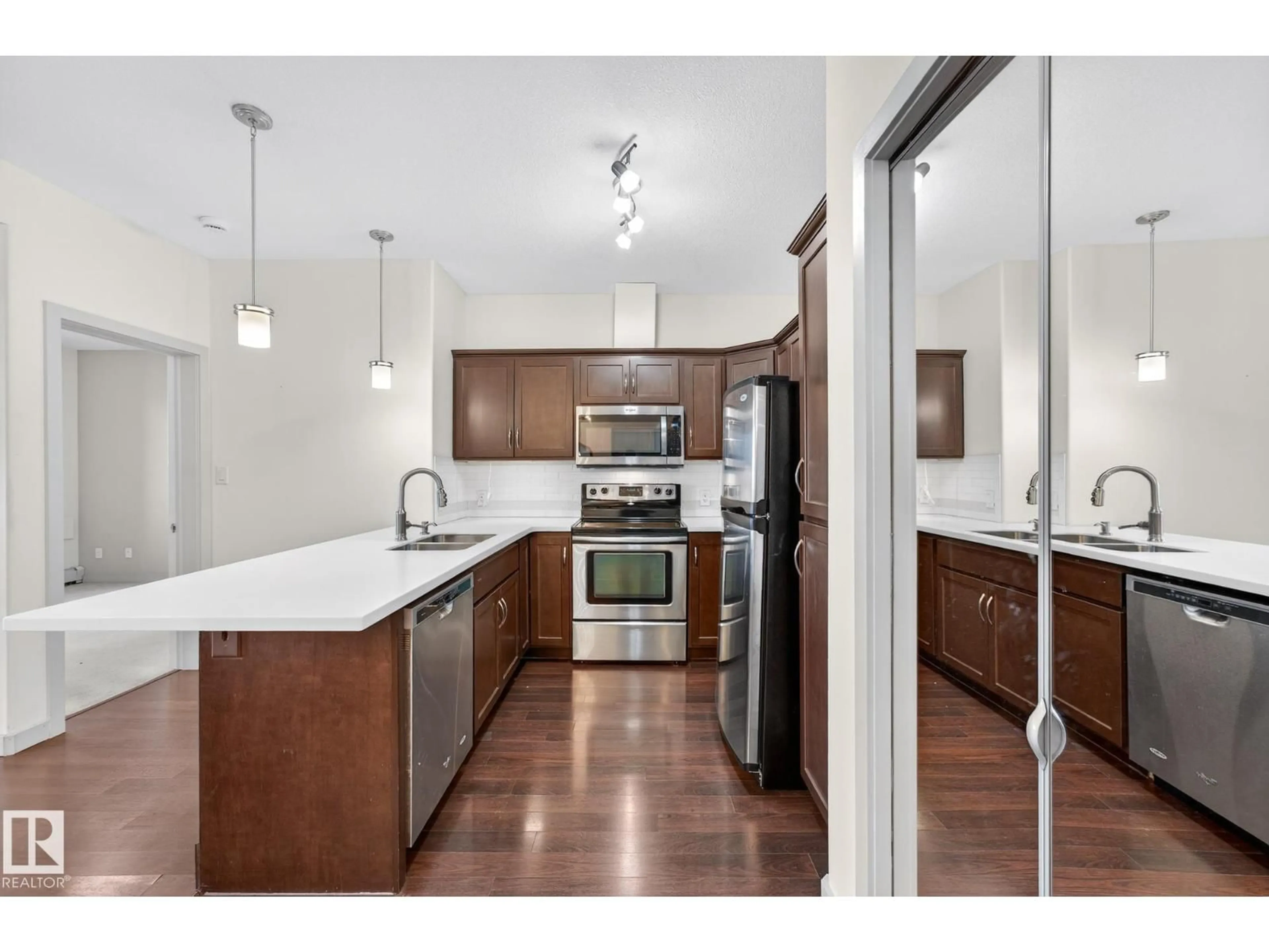 Open concept kitchen, unknown for 304 - 316 AMBLESIDE LI, Edmonton Alberta T6W0V2