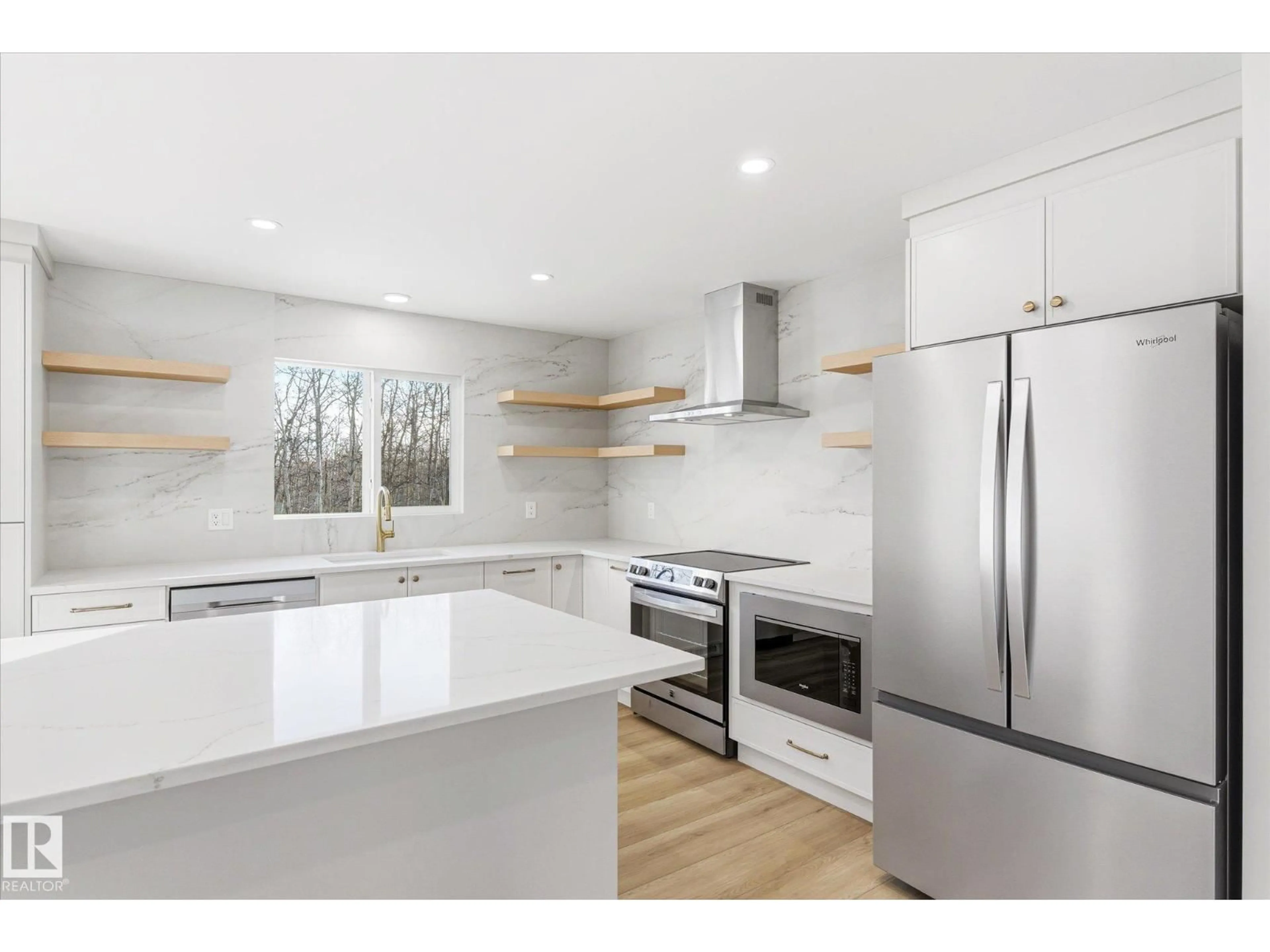 Open concept kitchen, wood/laminate floor for 51112 - 194 RGE ROAD 222, Rural Strathcona County Alberta T8C1G9