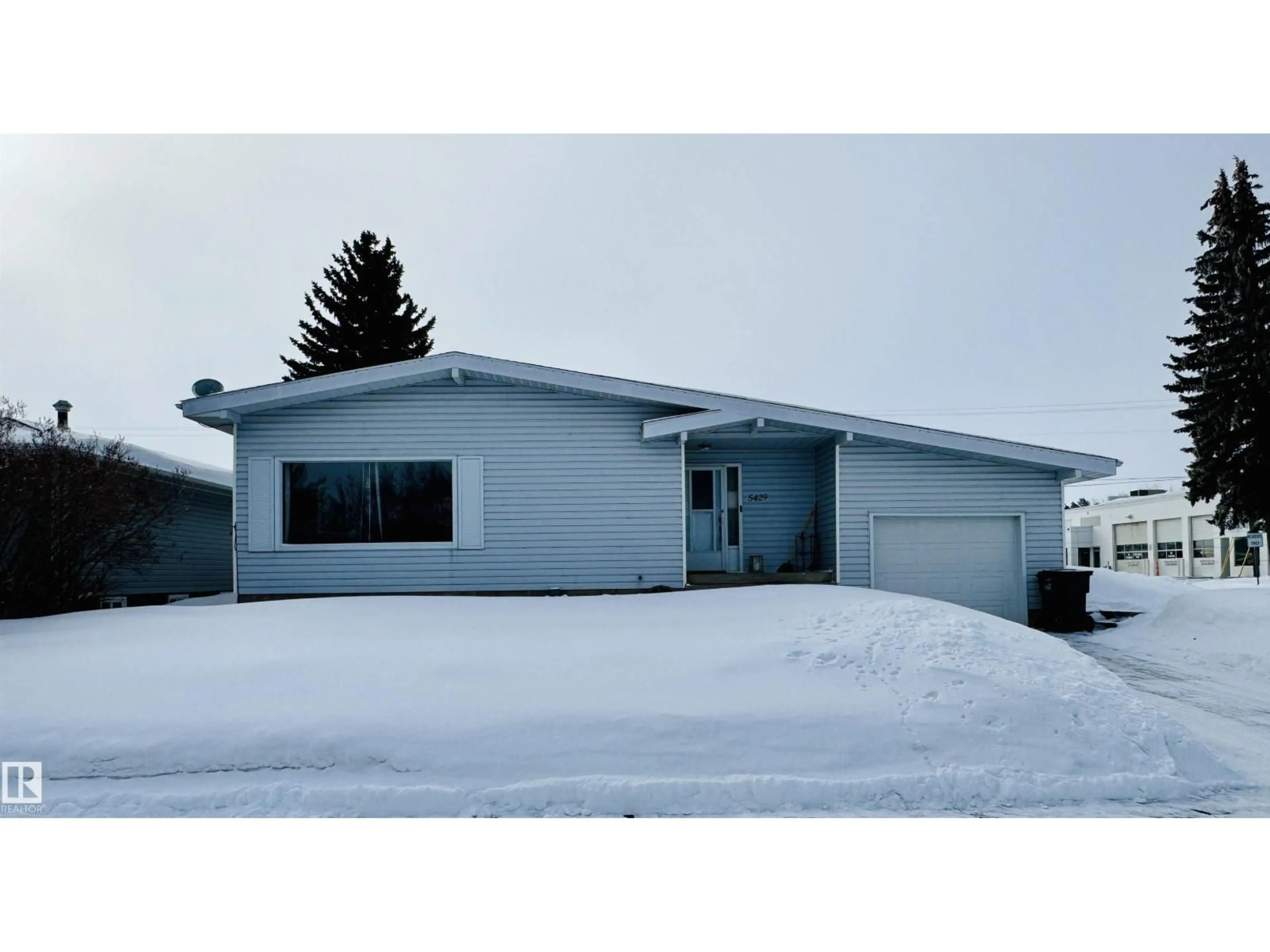 Home with vinyl exterior material, street for 5429 51 AV, St. Paul Town Alberta T0A3A1