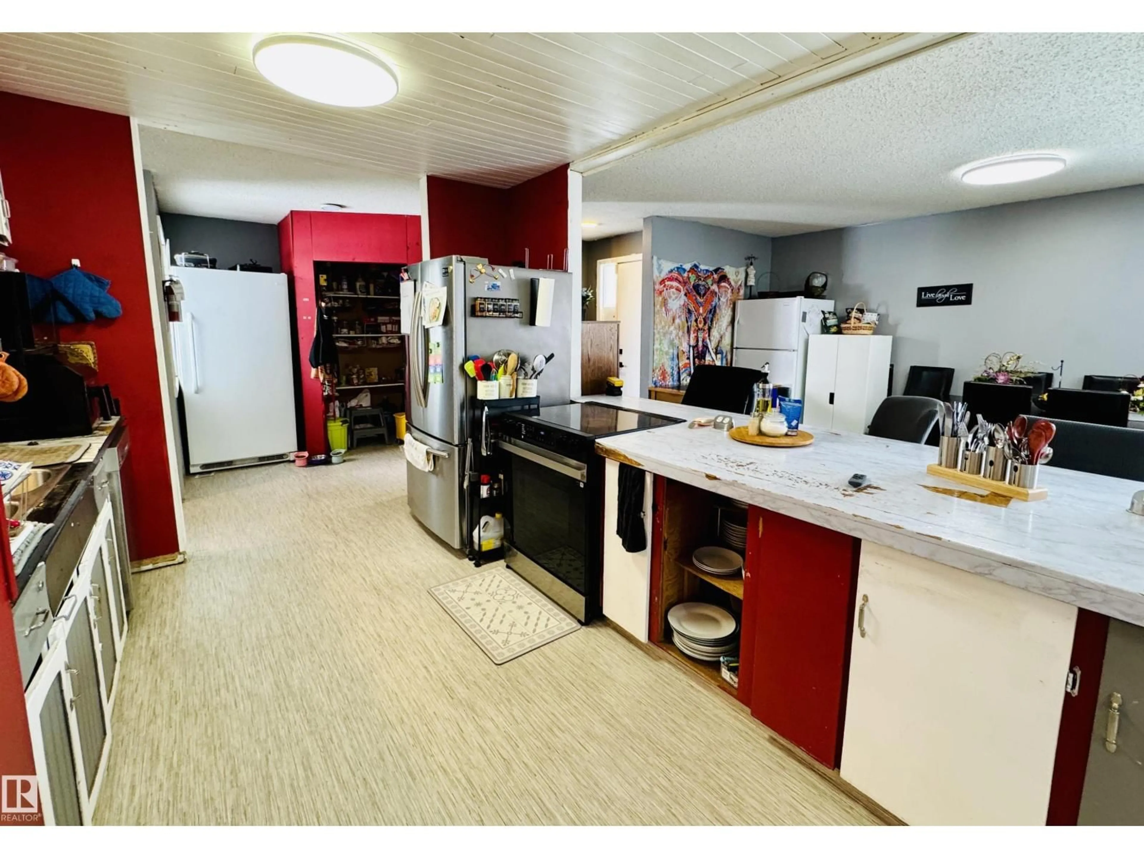Kitchen with laundary machines, unknown for 5429 51 AV, St. Paul Town Alberta T0A3A1
