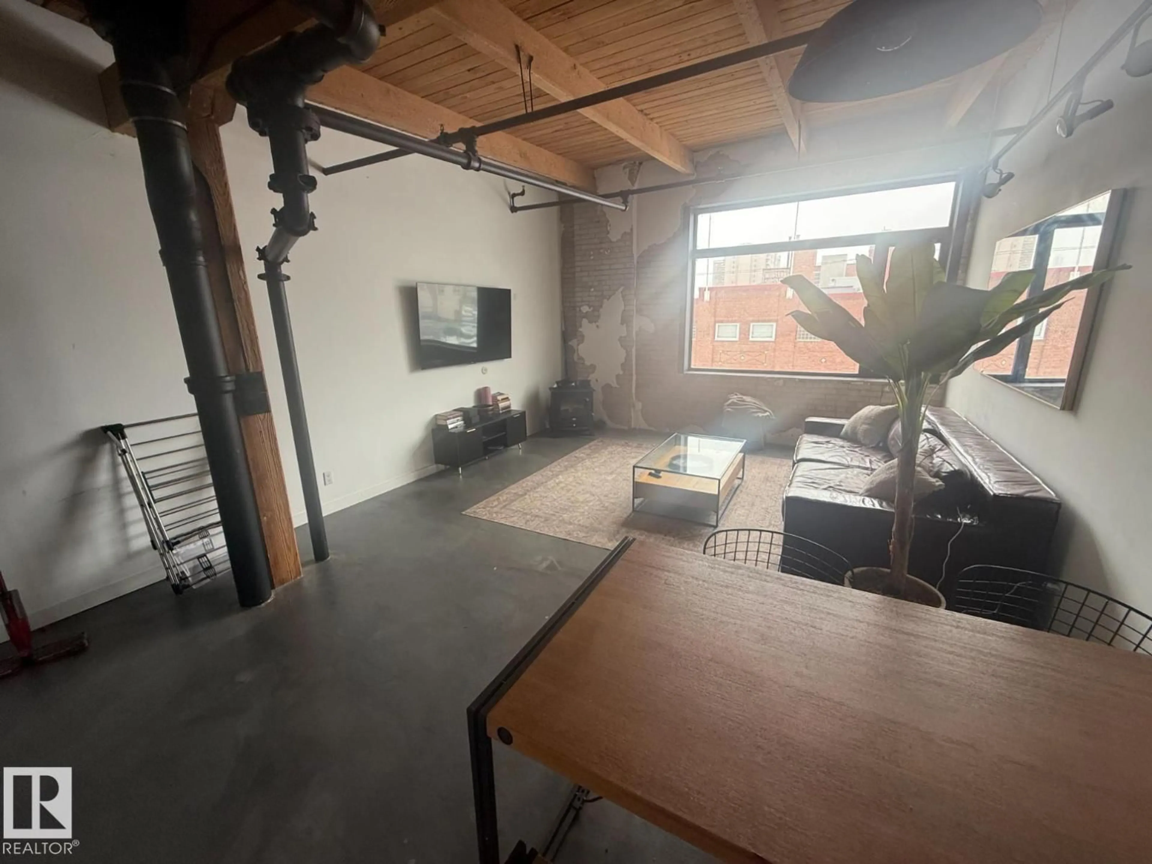 A pic of a room for #212 - 10309 107 ST, Edmonton Alberta T5J1K3