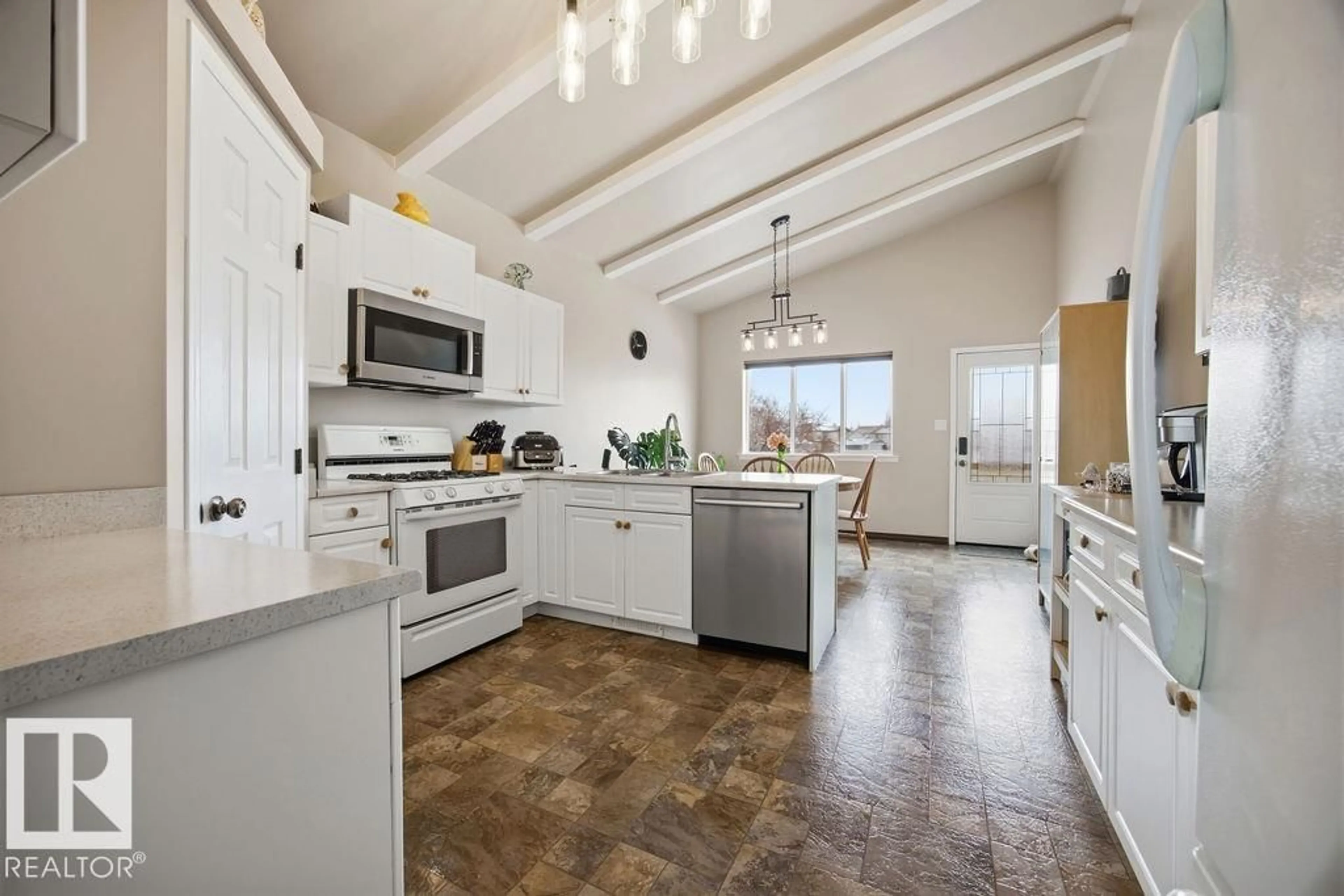 Open concept kitchen, ceramic/tile floor for NW - 9007 166 AV, Edmonton Alberta T5Z3H5