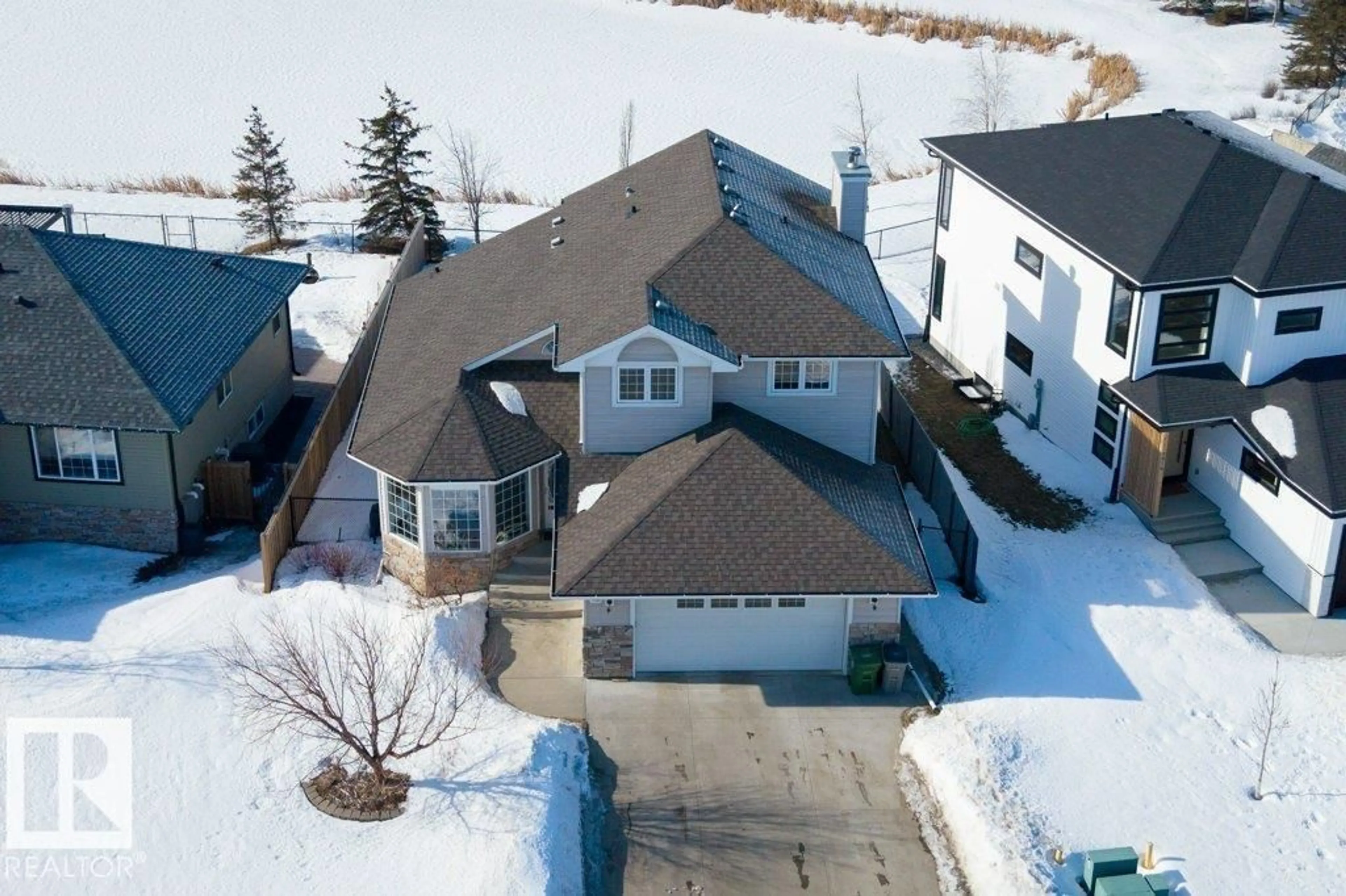 A pic from outside/outdoor area/front of a property/back of a property/a pic from drone, street for 7908 97 ST, Morinville Alberta T8R1W1