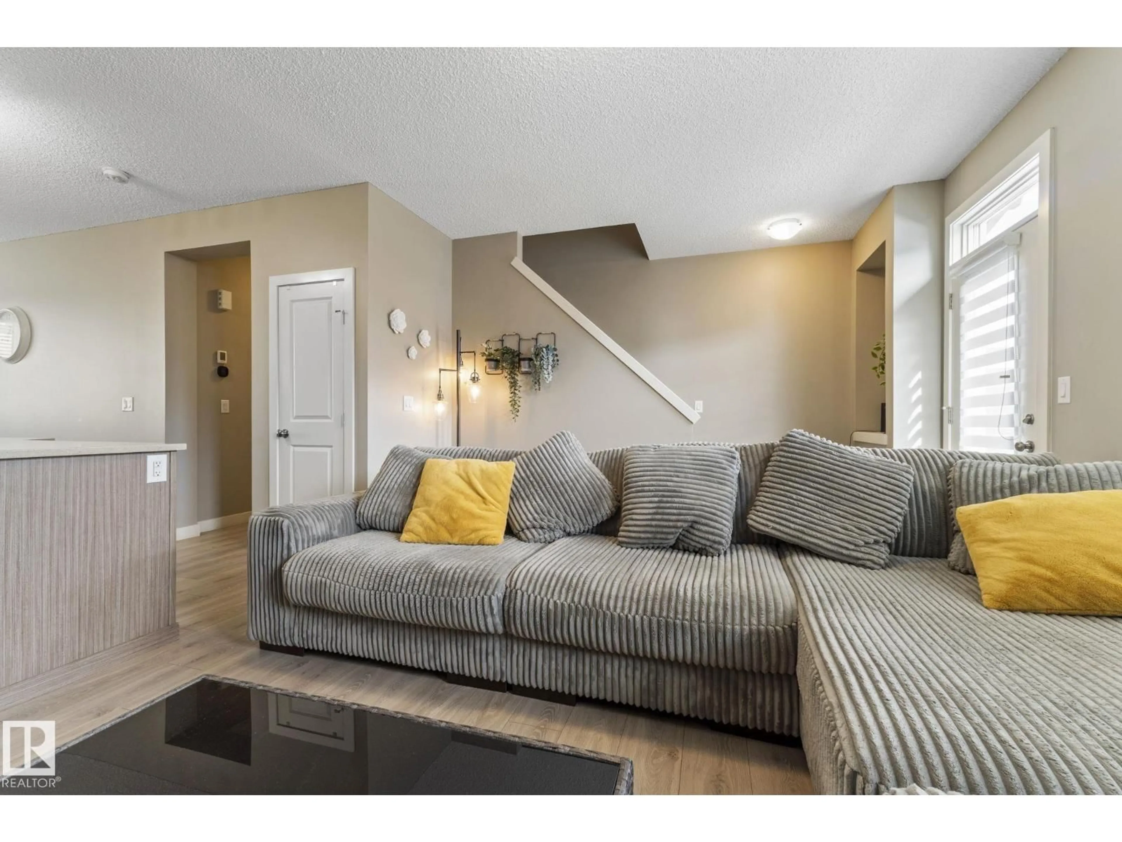 Living room with furniture, unknown for 27 16903 68 ST NW, Edmonton Alberta T5Z0R1