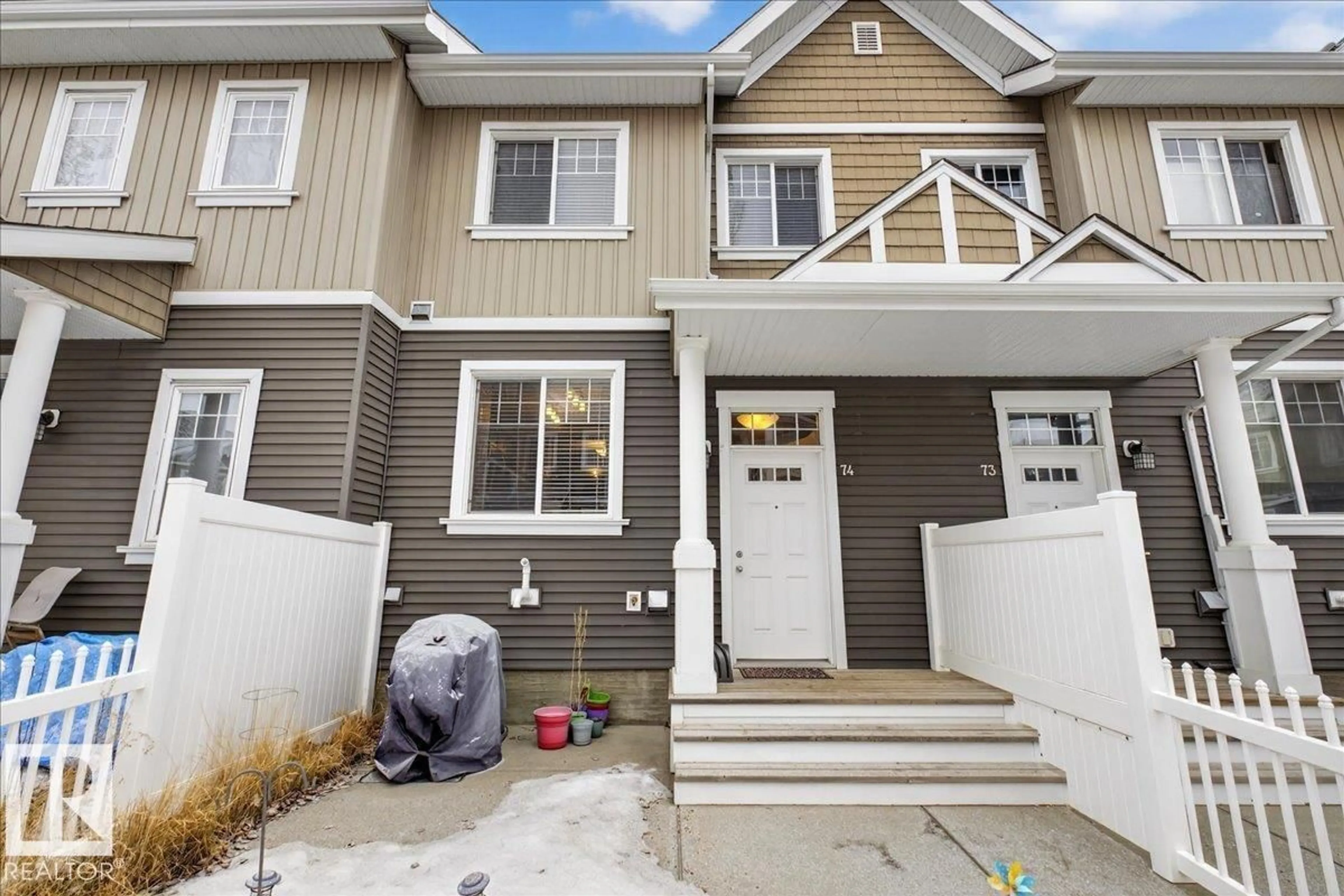 Home with vinyl exterior material, street for 4050 - 74 SAVARYN DR, Edmonton Alberta T6X1R8