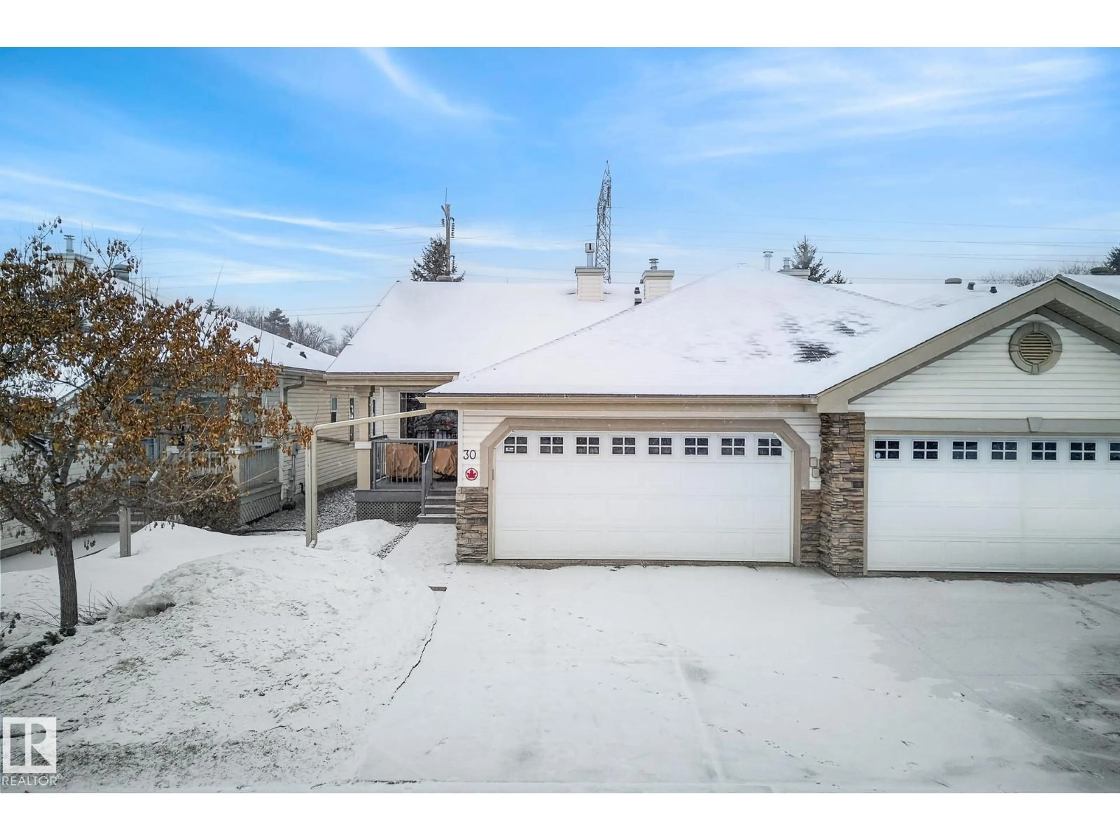 A pic from outside/outdoor area/front of a property/back of a property/a pic from drone, street for 4 - 30 HERITAGE WY, St. Albert Alberta T8N6W3