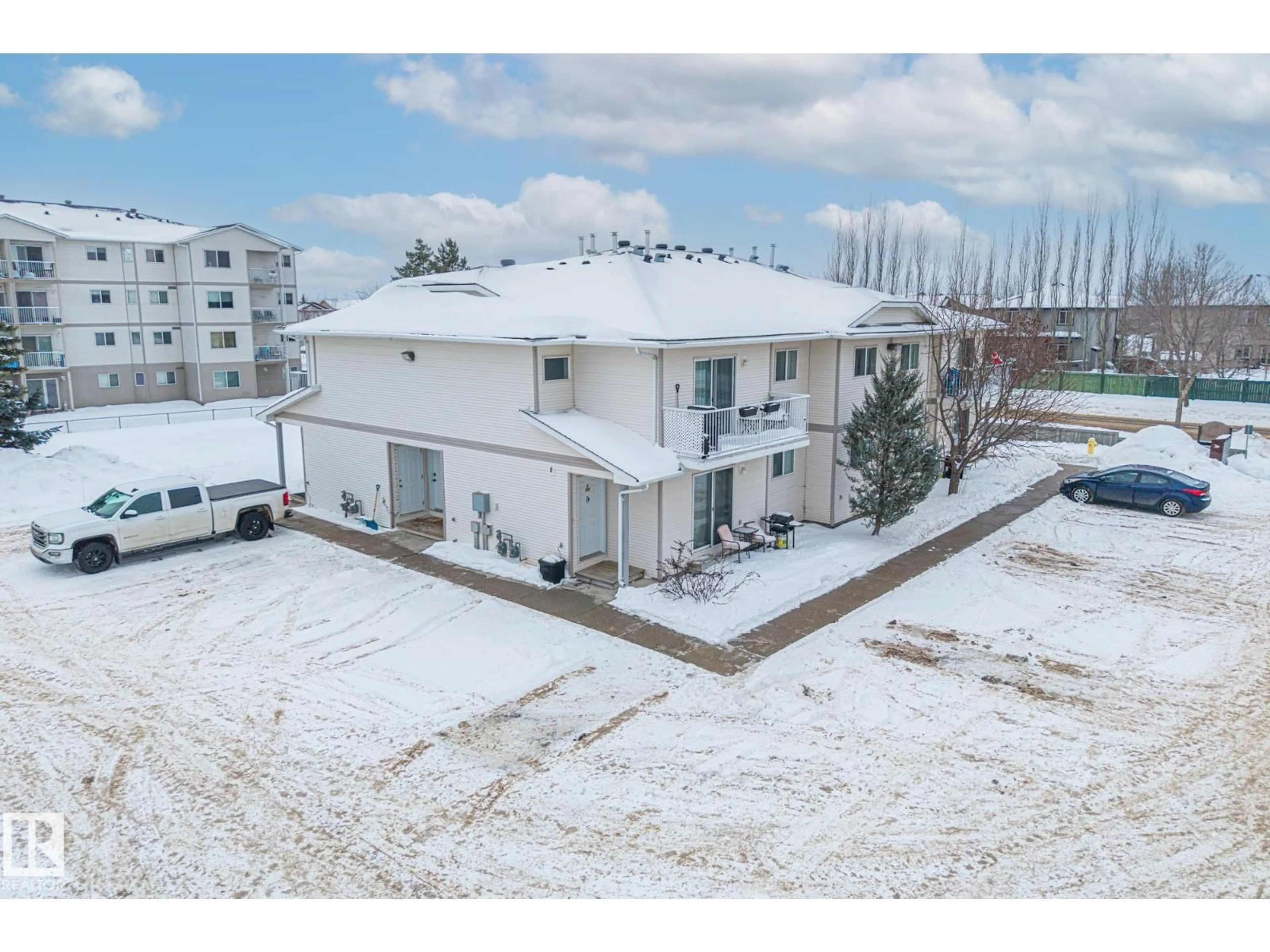 A pic from outside/outdoor area/front of a property/back of a property/a pic from drone, building for #101A - 110 WESTPARK, Fort Saskatchewan Alberta T8L4M2