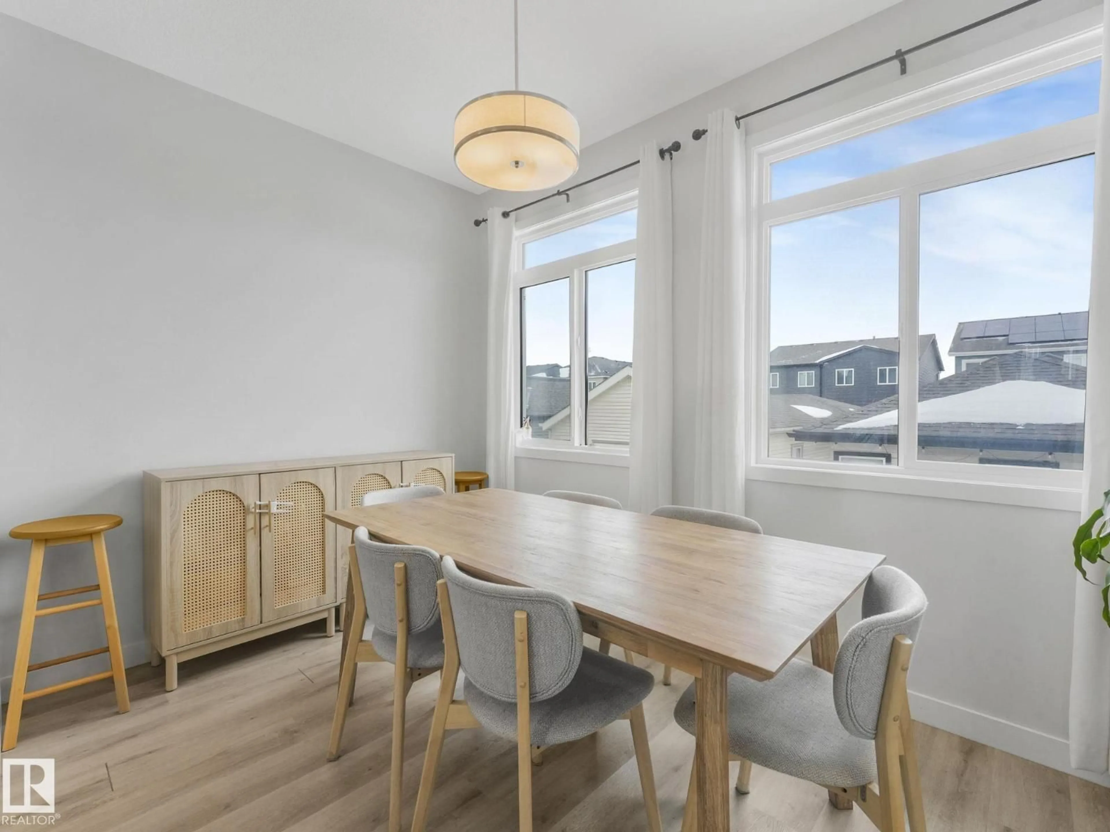 Dining room, wood/laminate floor for 1404 PODERSKY LI, Edmonton Alberta T6W4W4
