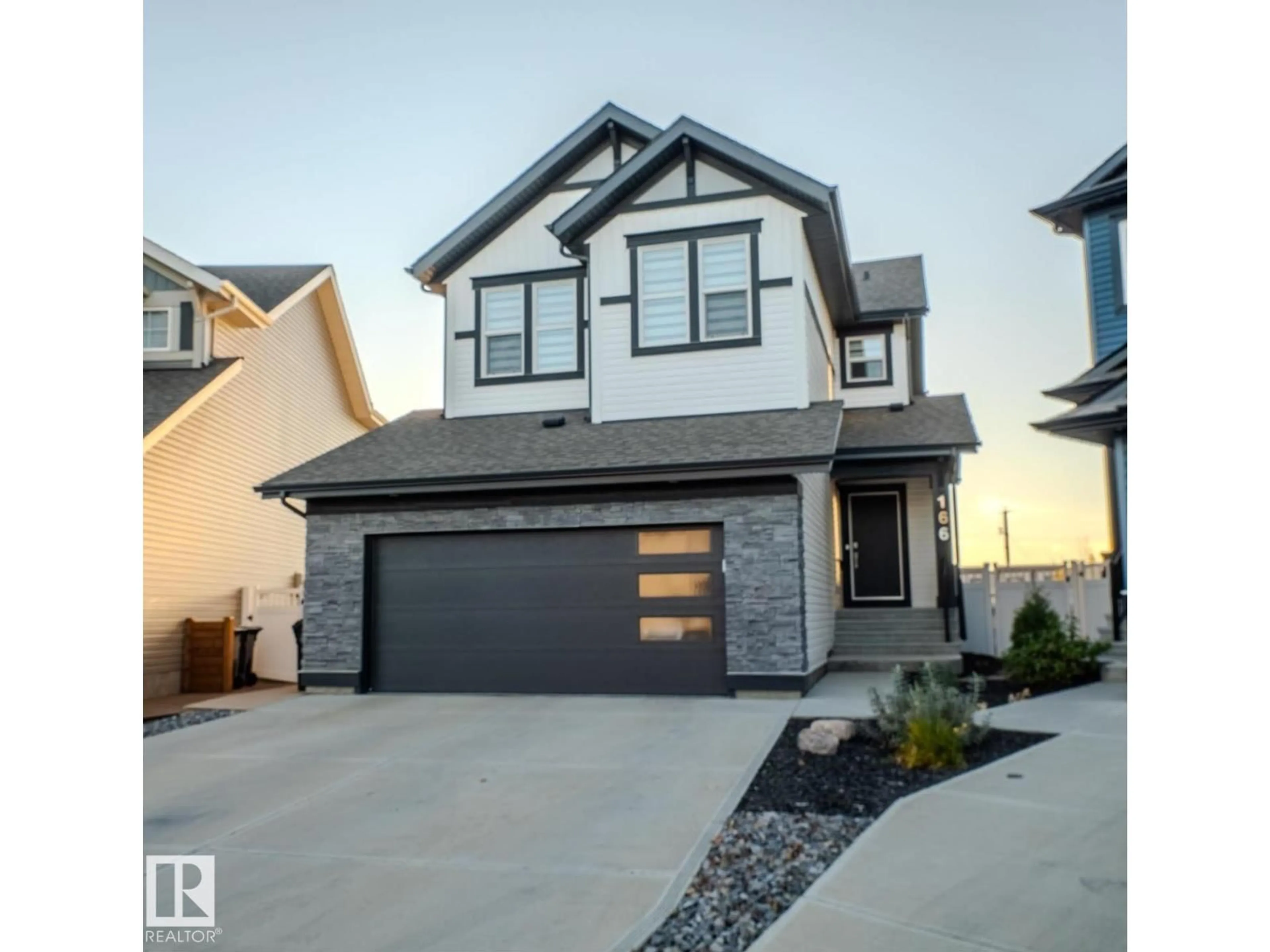 Home with vinyl exterior material, street for 166 SEDUM WY, Sherwood Park Alberta T8H2X8