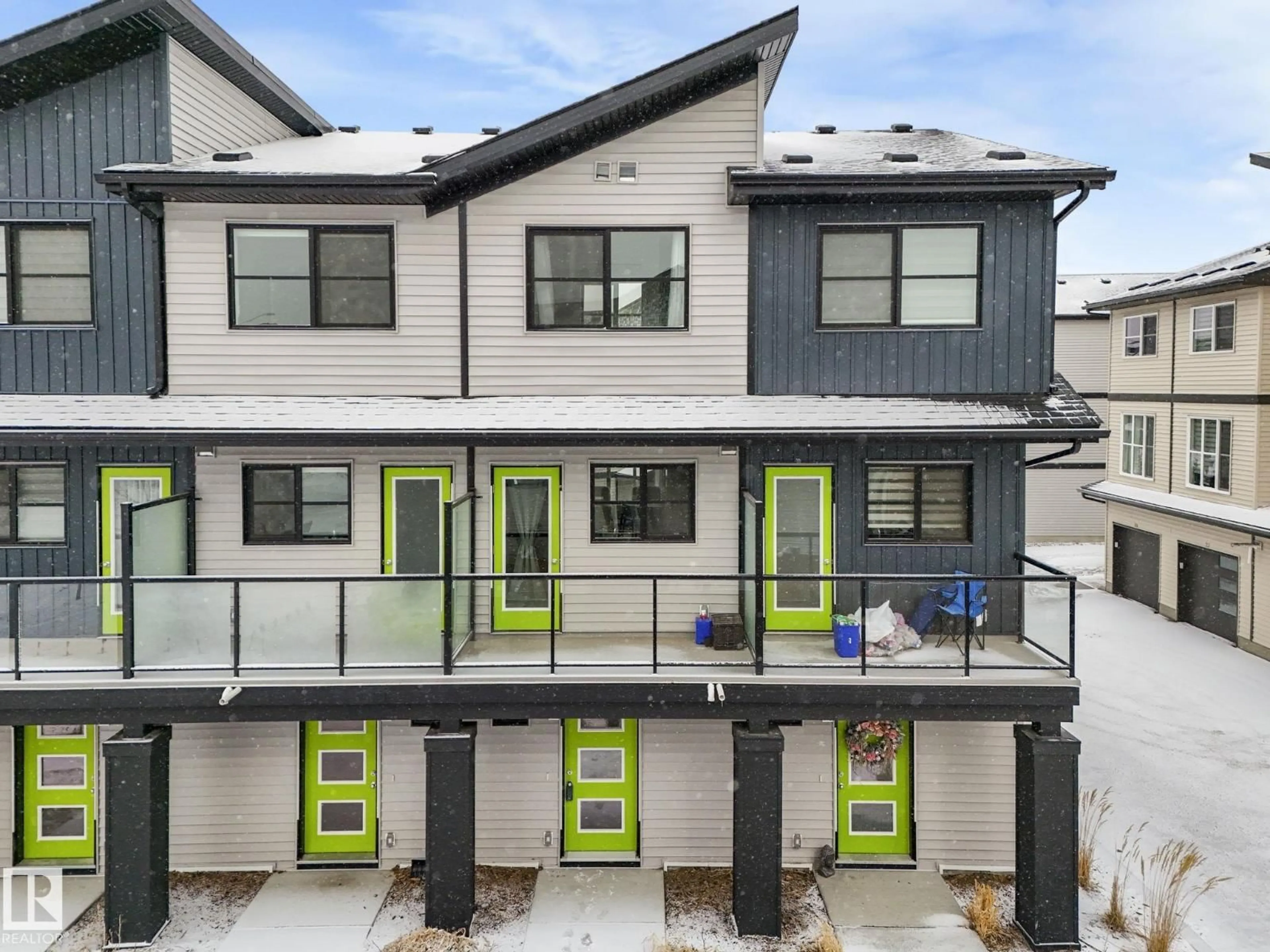 Home with vinyl exterior material, street for 18 - 1203 163 ST, Edmonton Alberta T6W3X1