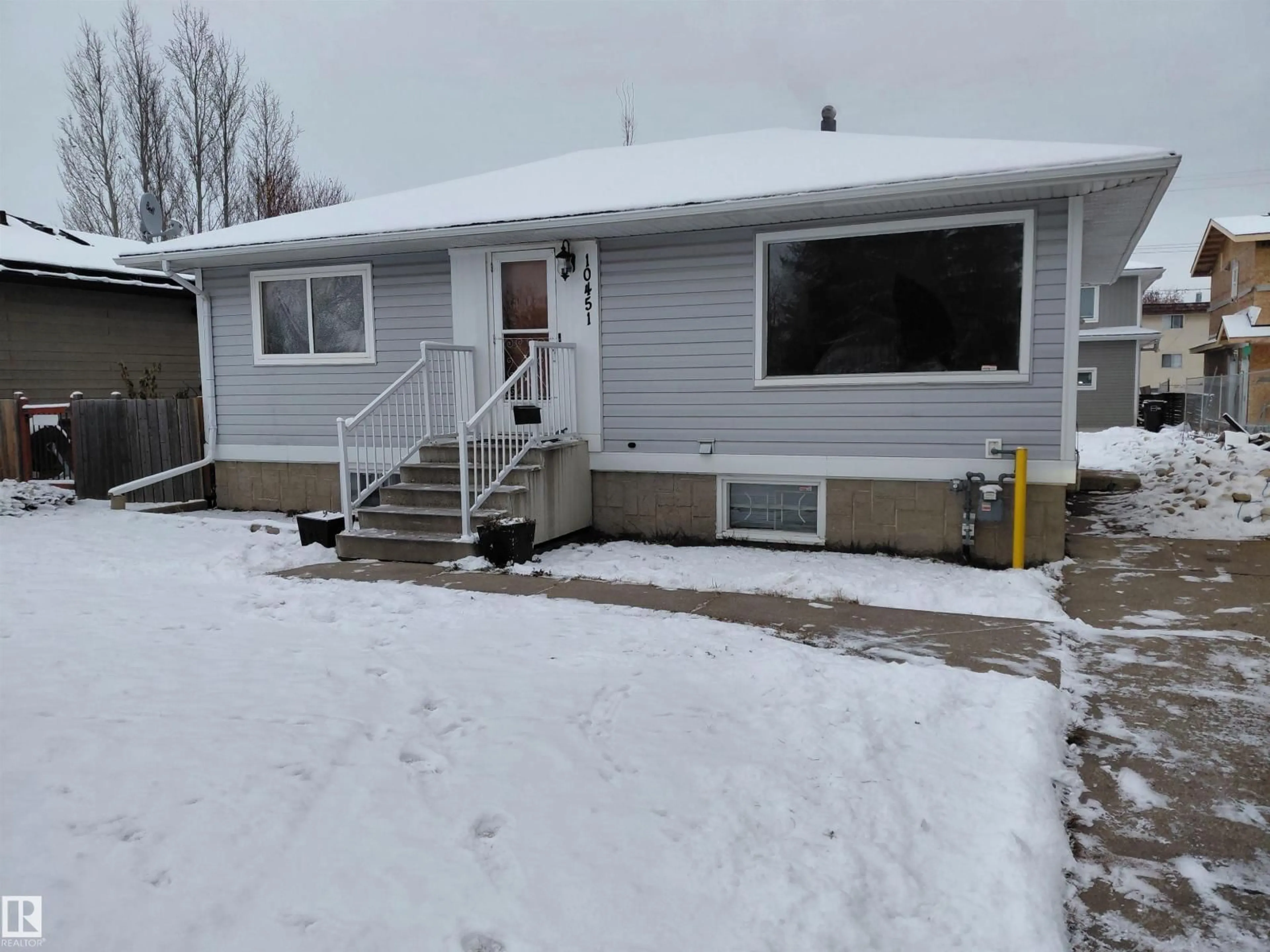 Home with vinyl exterior material, street for 10451 157 ST NW, Edmonton Alberta T5P2V1
