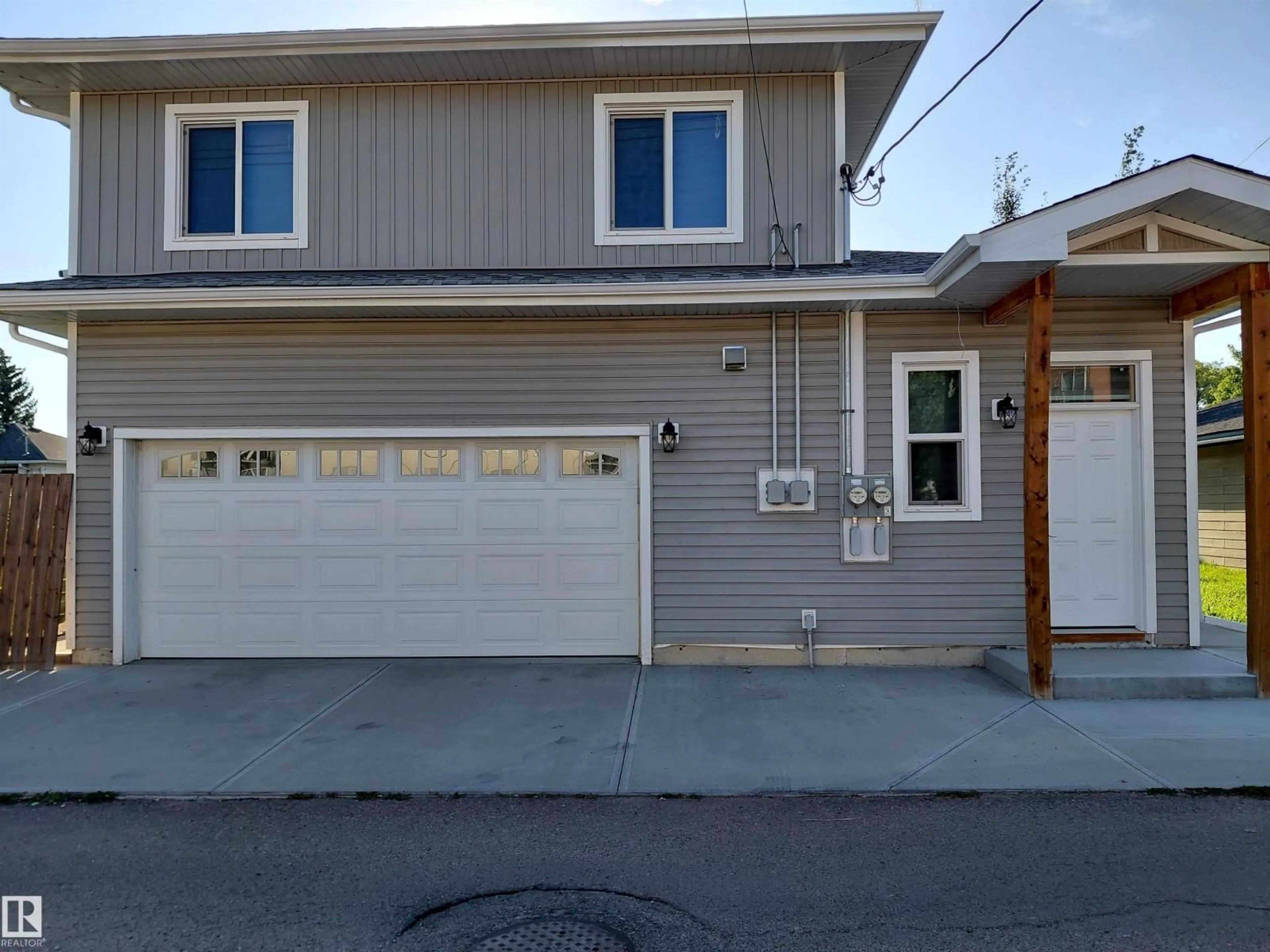 Home with vinyl exterior material, street for 10451 157 ST NW, Edmonton Alberta T5P2V1