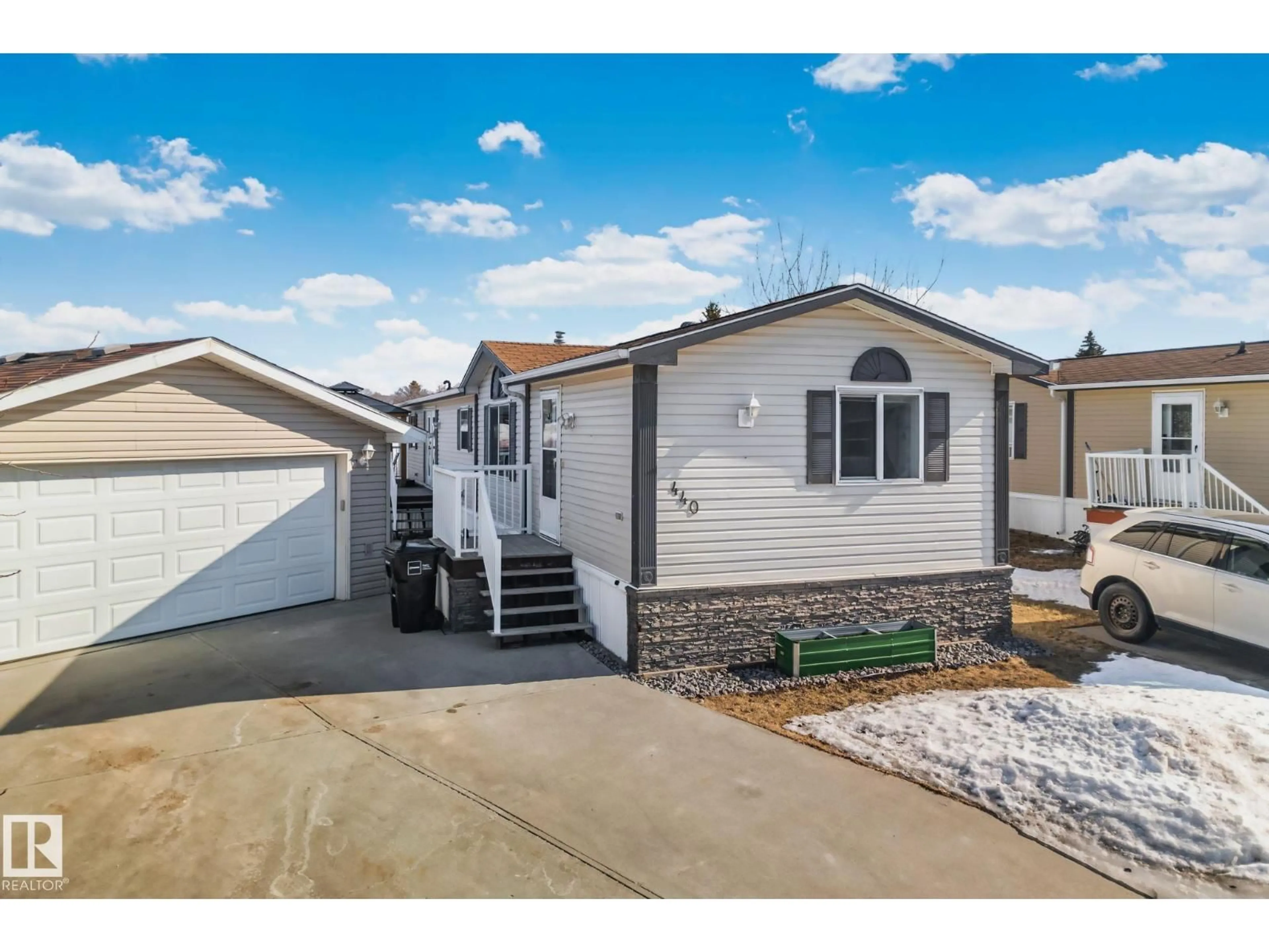 Home with vinyl exterior material, street for NW - 440 OAK WOOD CR, Edmonton Alberta T6P0B2