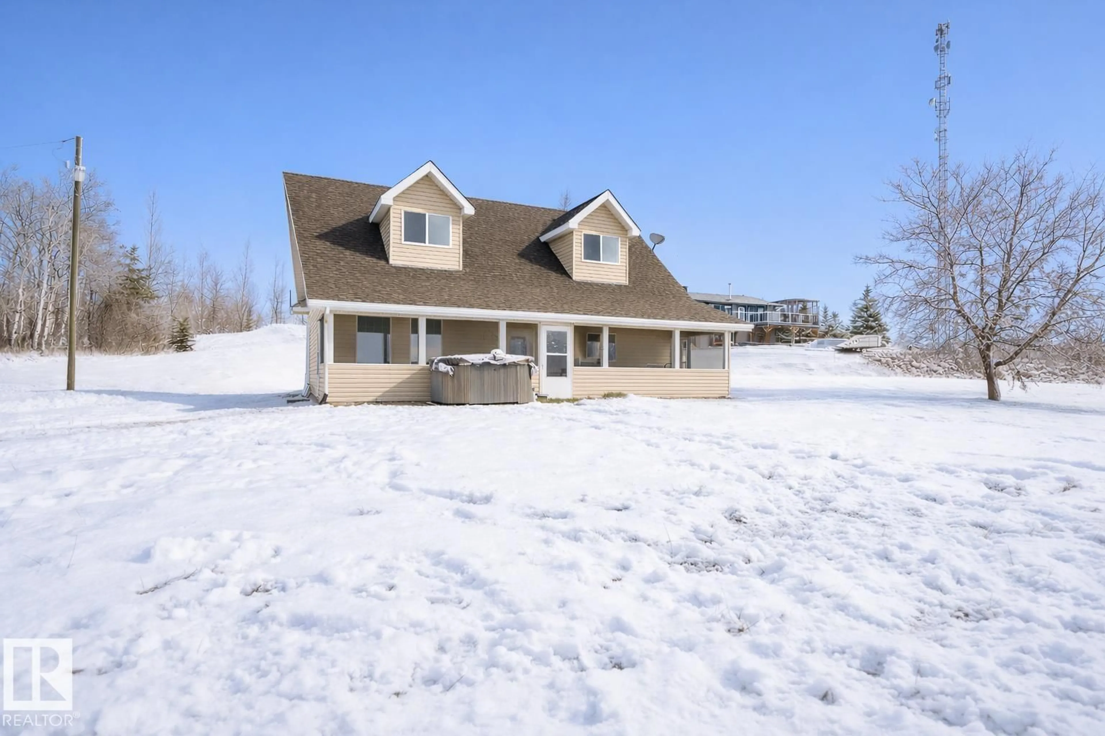 Home with vinyl exterior material, street for 61307 RR 463 A, Rural Bonnyville M.D. Alberta T9N2H6