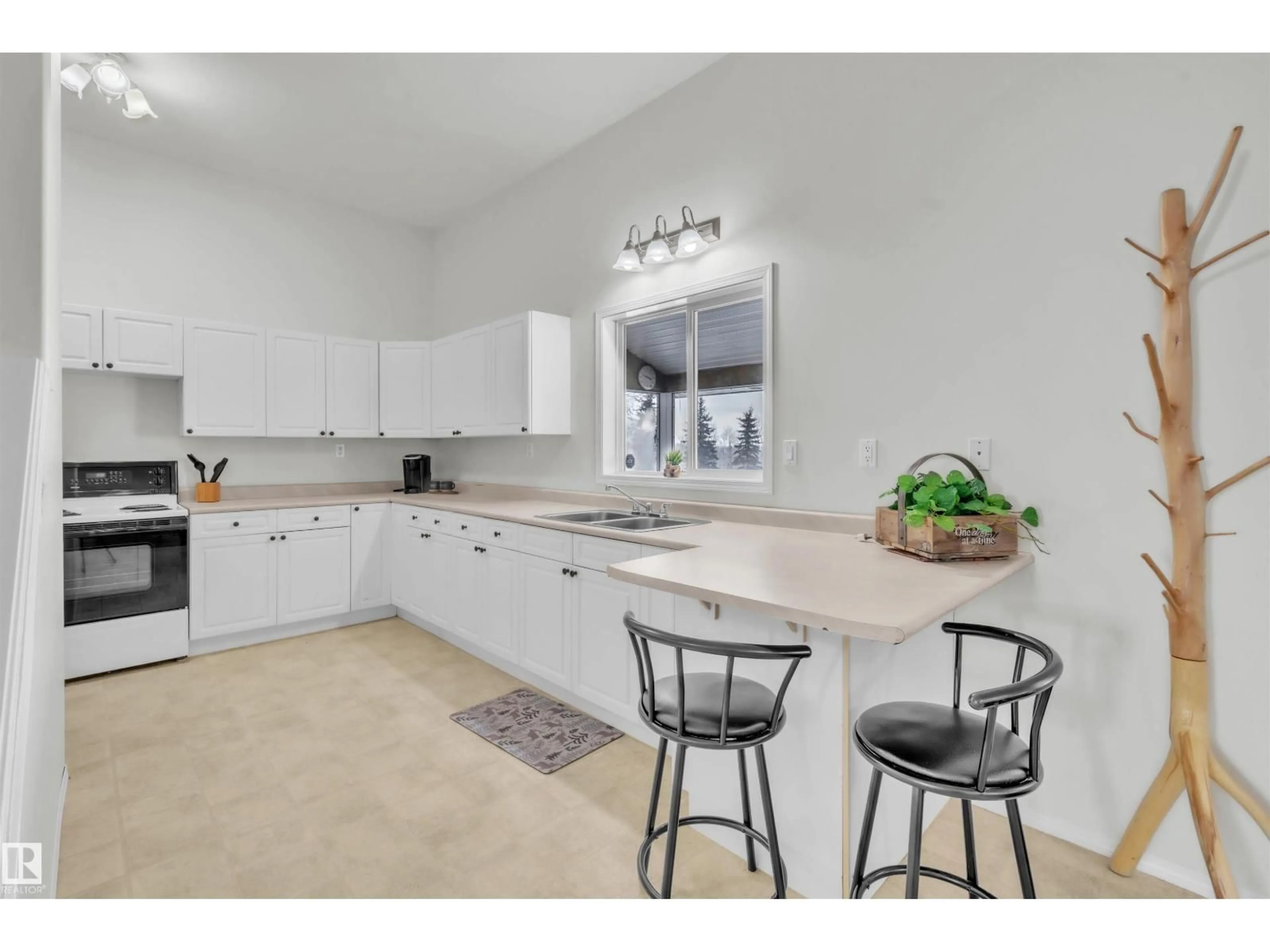 Open concept kitchen, ceramic/tile floor for 61307 RR 463 A, Rural Bonnyville M.D. Alberta T9N2H6