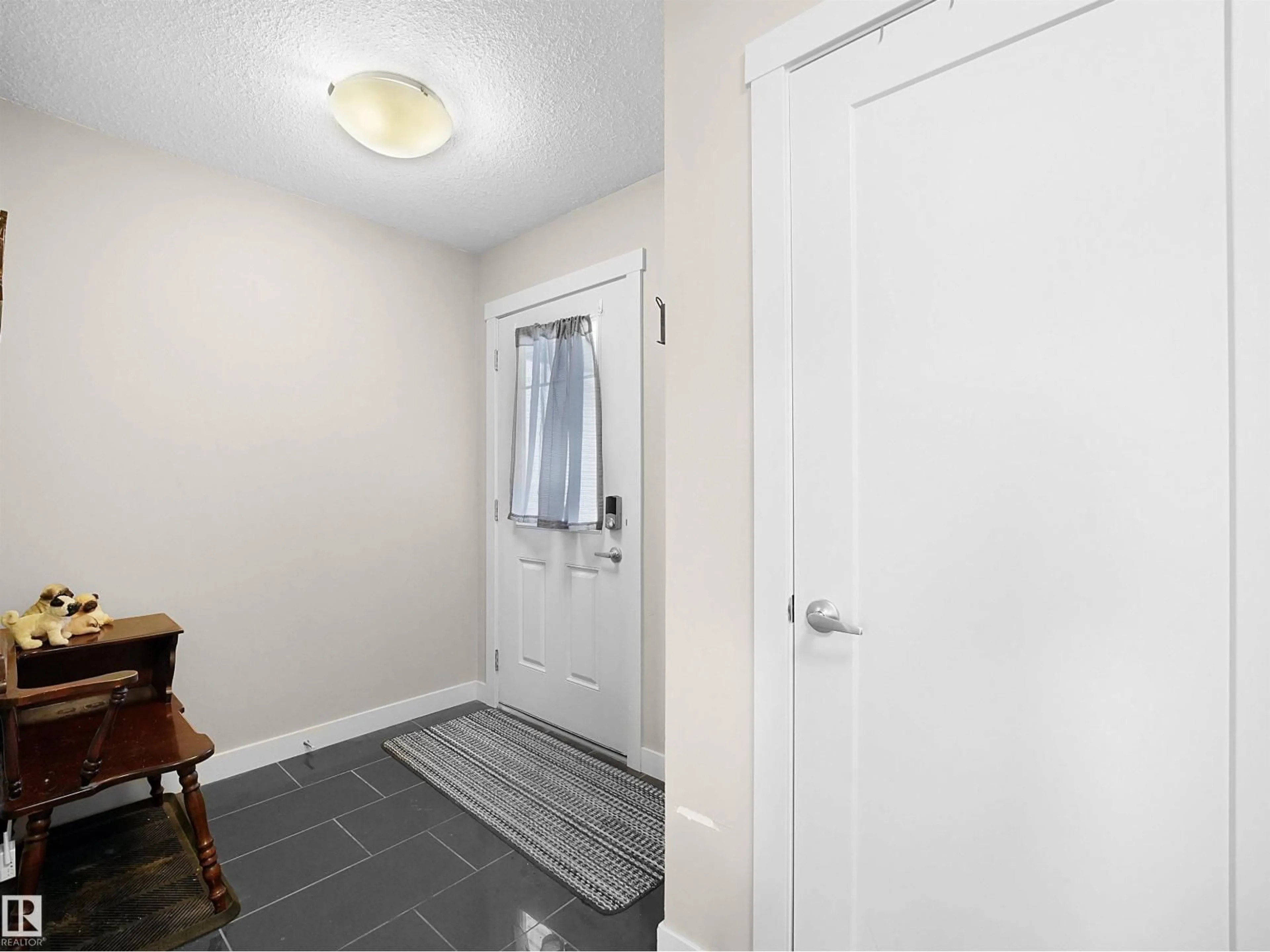 Indoor entryway for NW - 1659 HAMMOND CR, Edmonton Alberta T6M0L8
