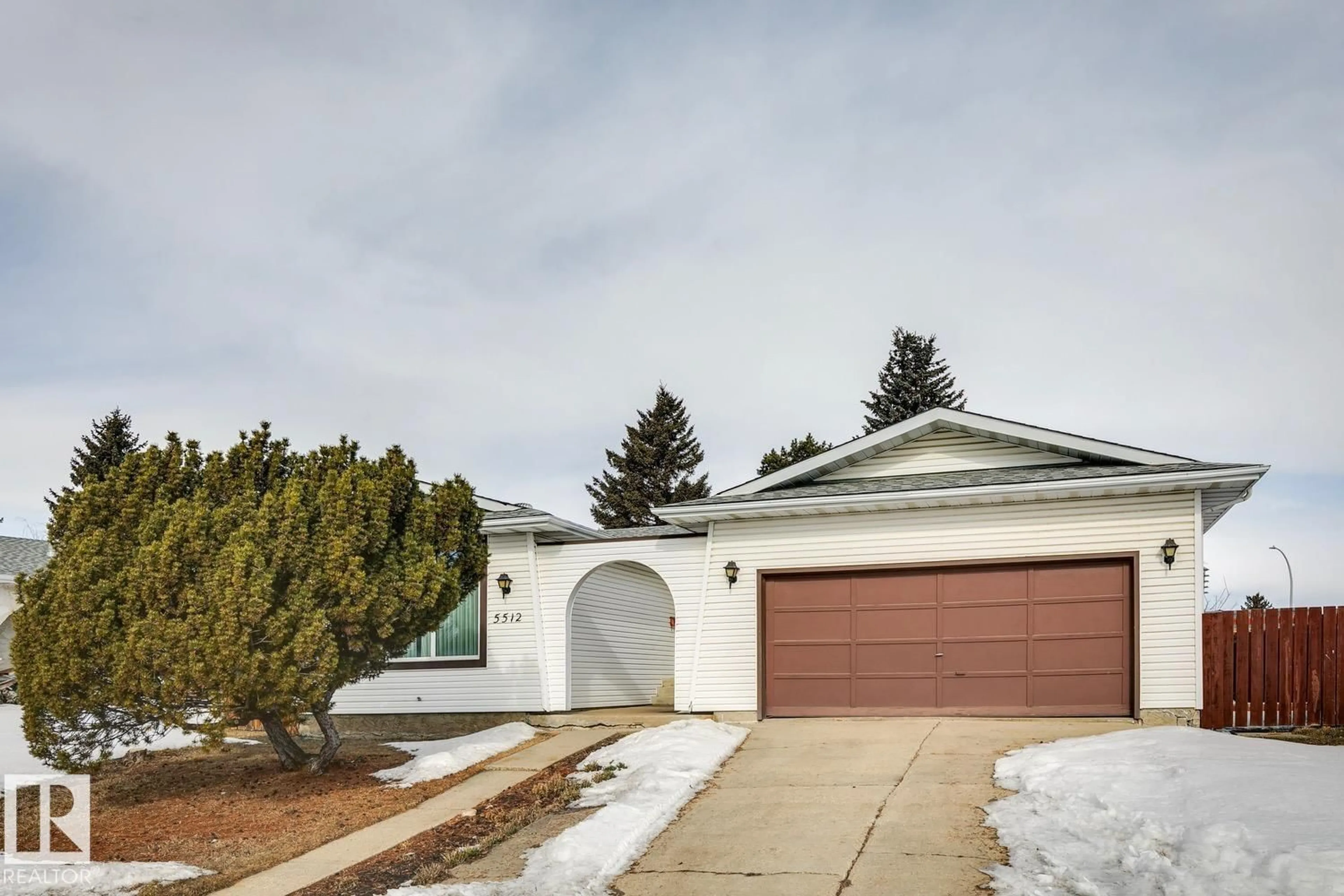 Home with vinyl exterior material, street for NW - 5512 150 AV, Edmonton Alberta T5A2L8