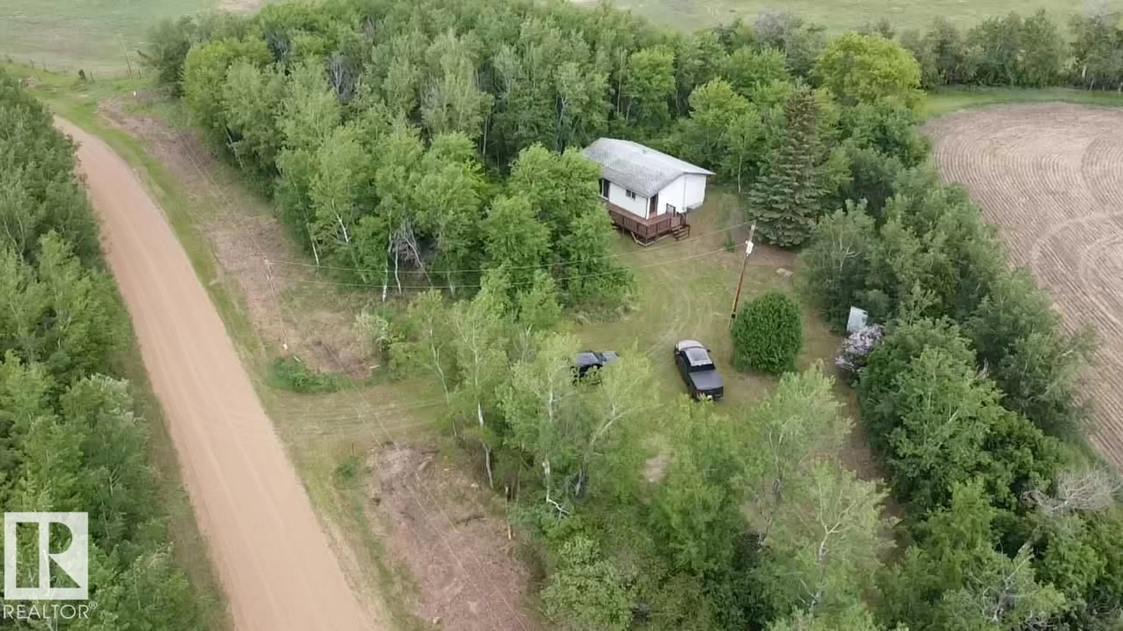 A pic from outside/outdoor area/front of a property/back of a property/a pic from drone, forest/trees view for 19042 VICTORIA TR, Rural Smoky Lake County Alberta T0A3C0