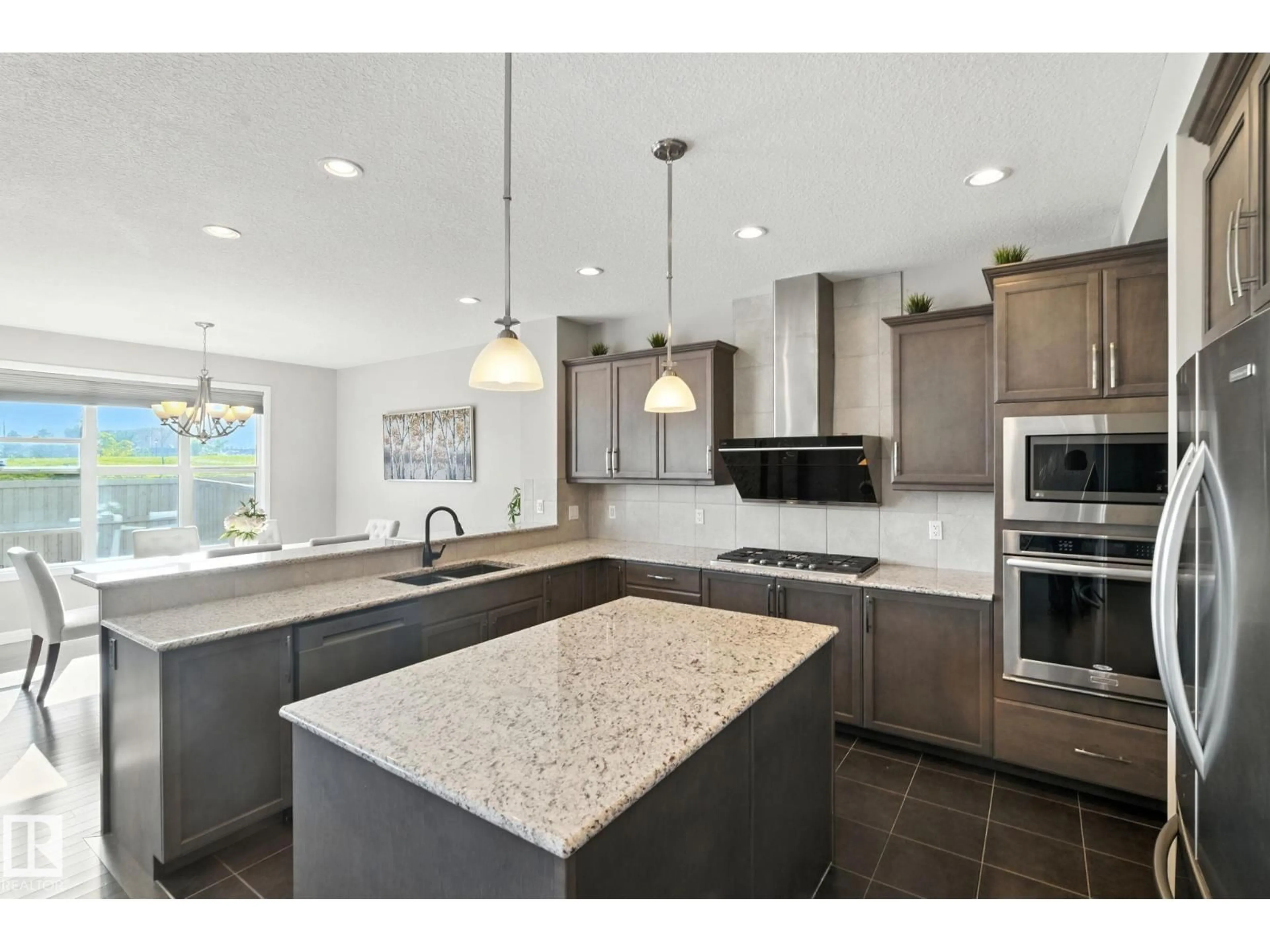 Open concept kitchen, ceramic/tile floor for 3875 AGAR GREEN SW, Edmonton Alberta T6W2G3