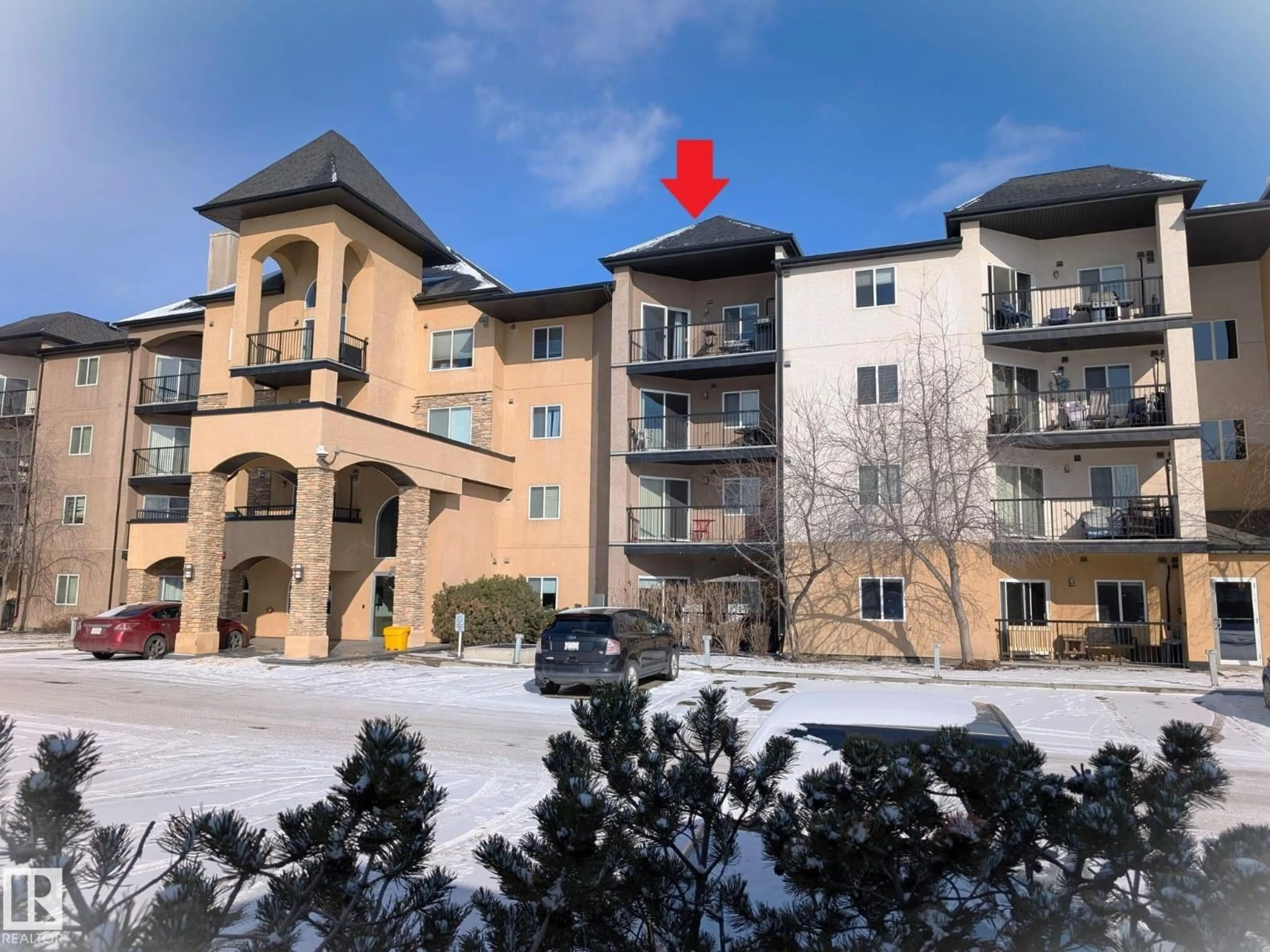 A pic from outside/outdoor area/front of a property/back of a property/a pic from drone, building for #415 - 14608 125 ST NW, Edmonton Alberta T5X0B5