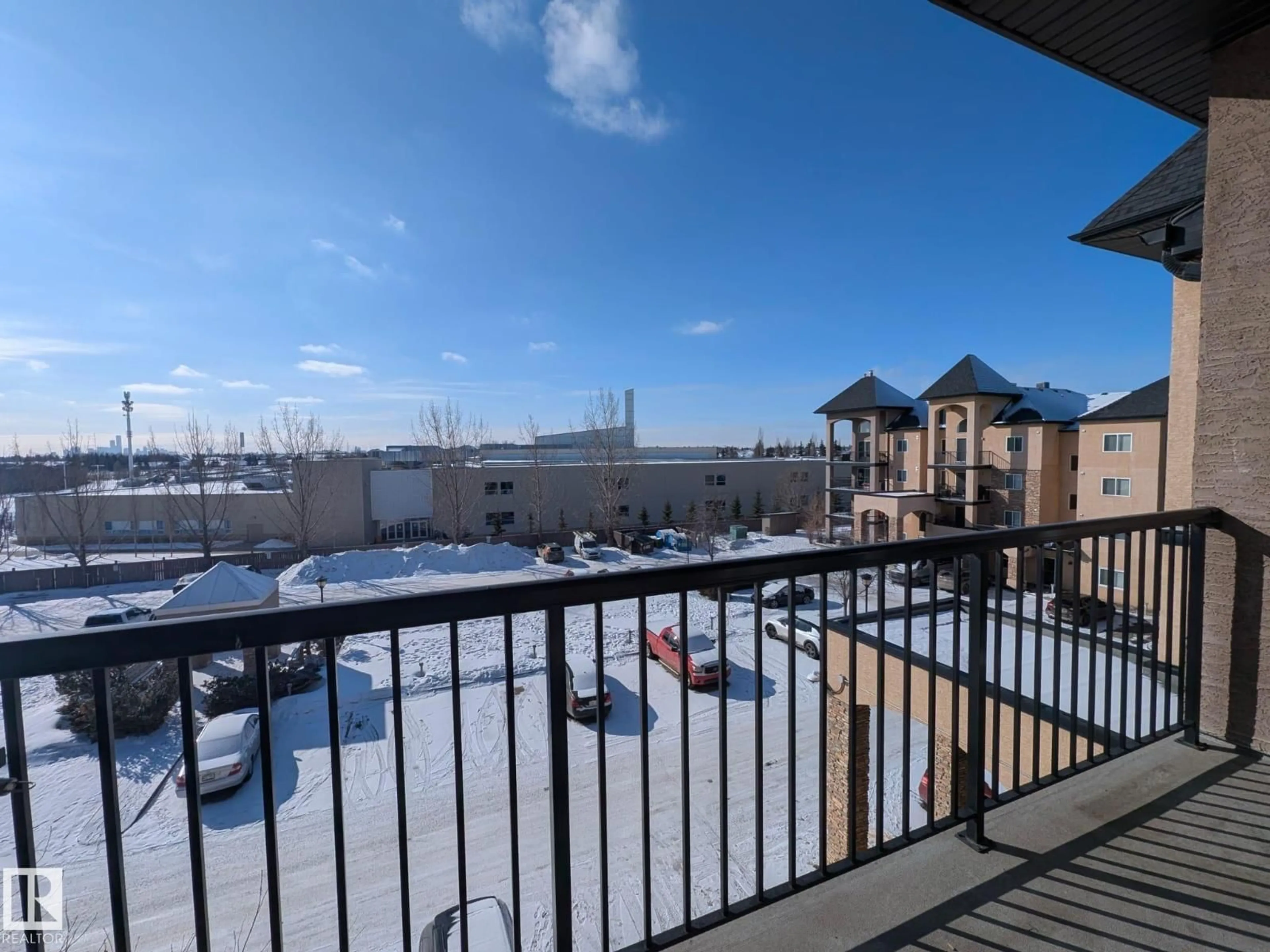 Patio, city buildings view from balcony for #415 - 14608 125 ST NW, Edmonton Alberta T5X0B5