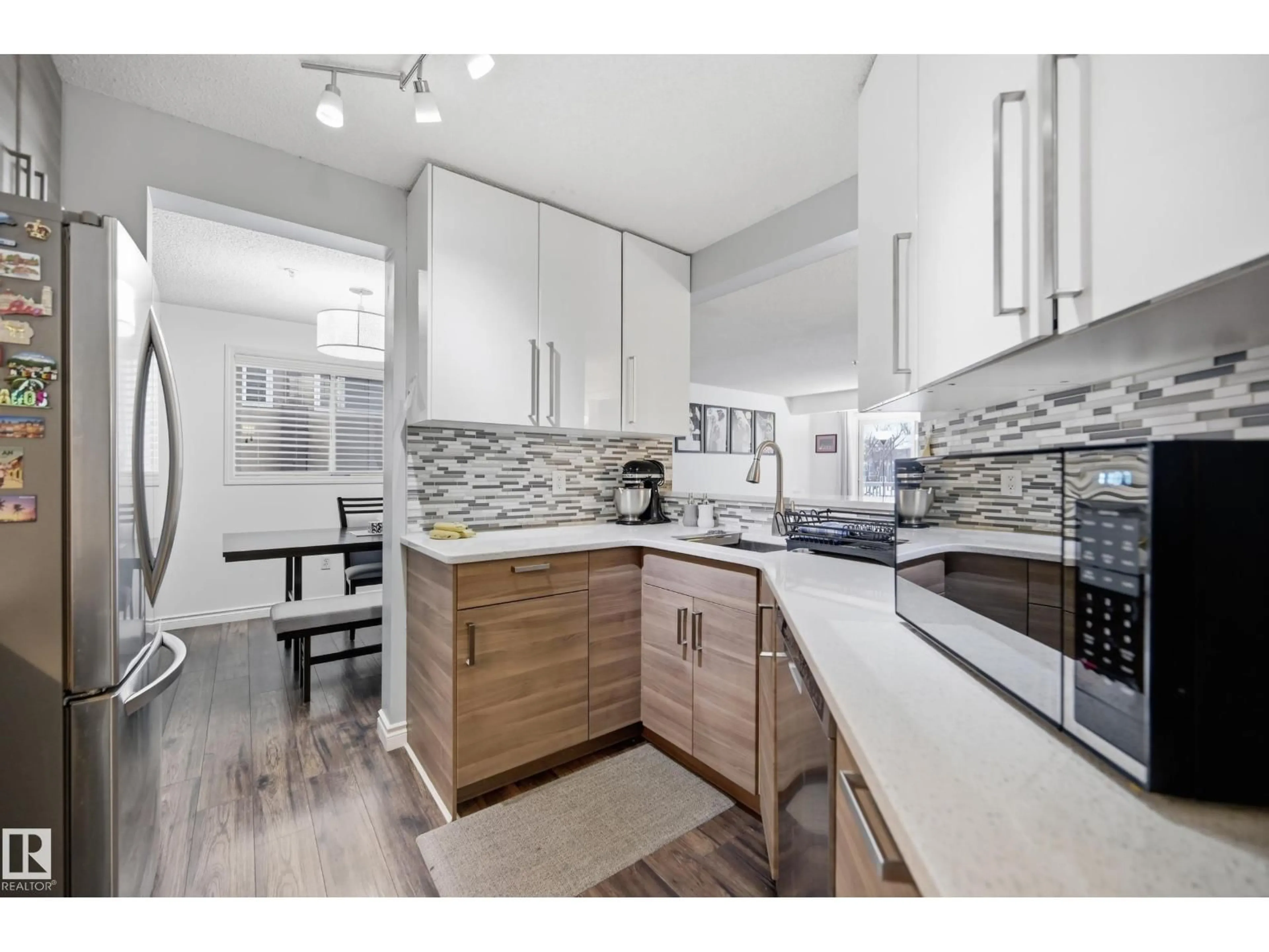 Open concept kitchen, unknown for #110 - 10153 117 ST, Edmonton Alberta T5K1X5