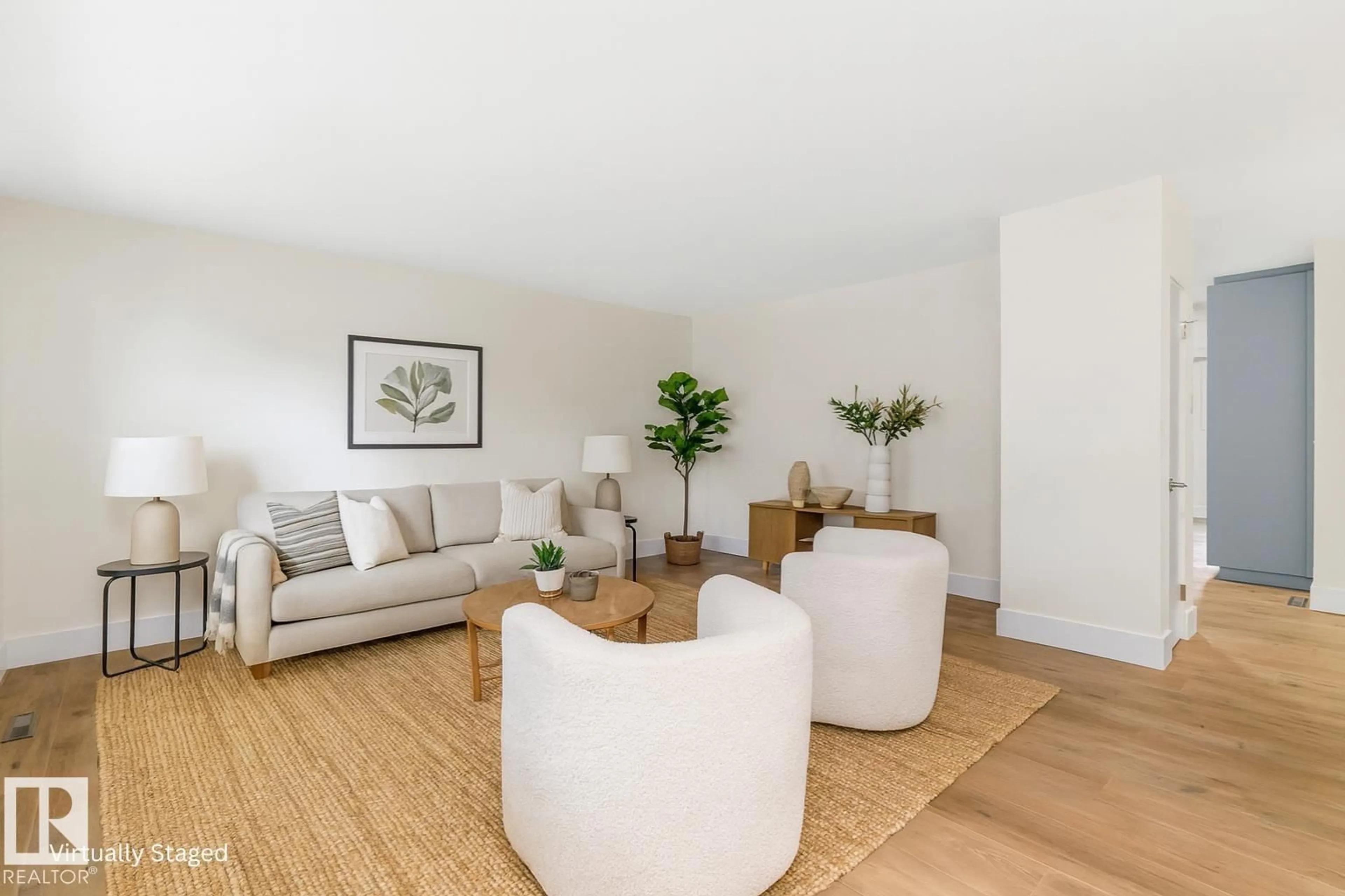 Living room with furniture, wood/laminate floor for NW - 8316 68A ST, Edmonton Alberta T6B1T3