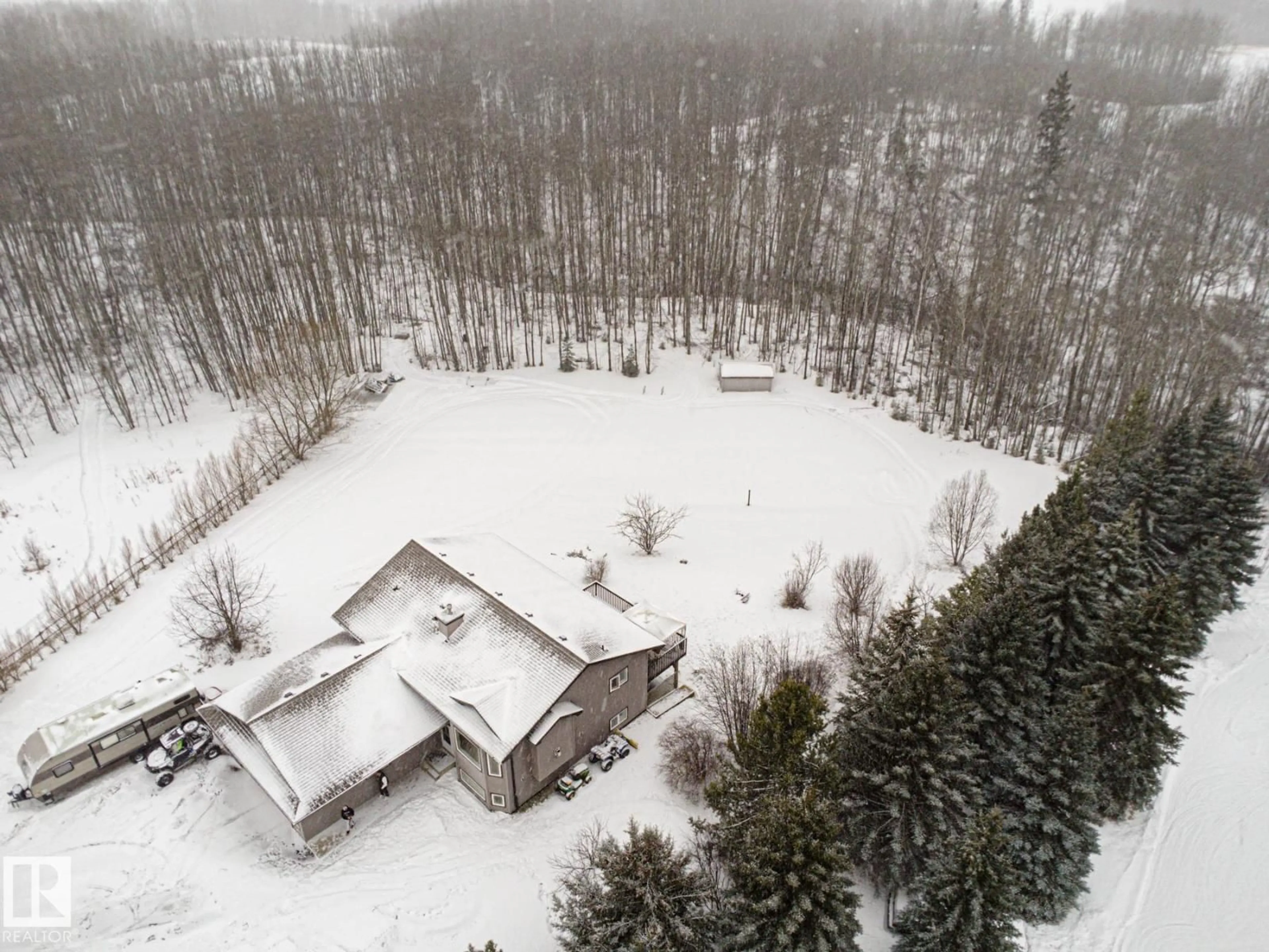 A pic from outside/outdoor area/front of a property/back of a property/a pic from drone, unknown for #123 - 52318 RGE ROAD 25, Rural Parkland County Alberta T7Y2M3