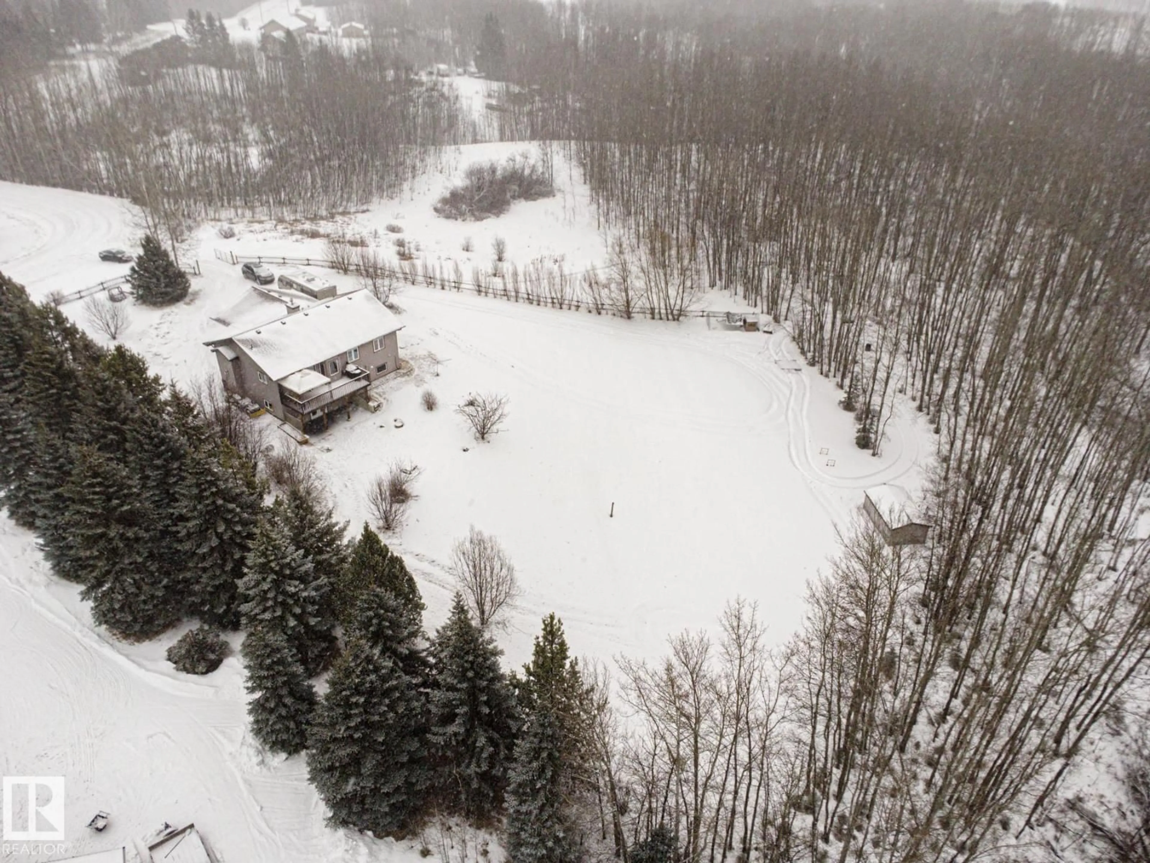 A pic from outside/outdoor area/front of a property/back of a property/a pic from drone, mountain view for #123 - 52318 RGE ROAD 25, Rural Parkland County Alberta T7Y2M3