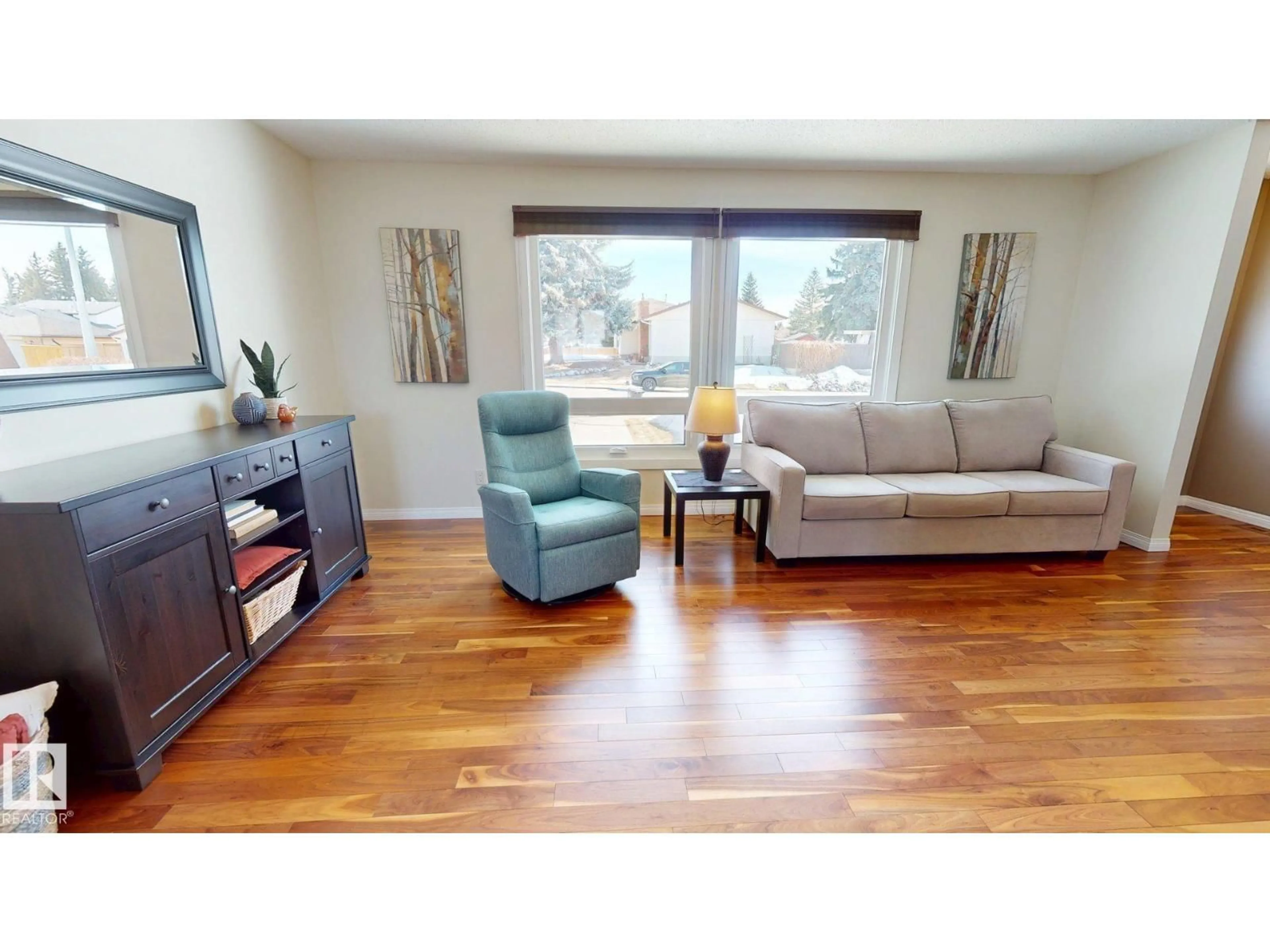 Living room with furniture, wood/laminate floor for 8 GUILFORD ST, Sherwood Park Alberta T8A3H2