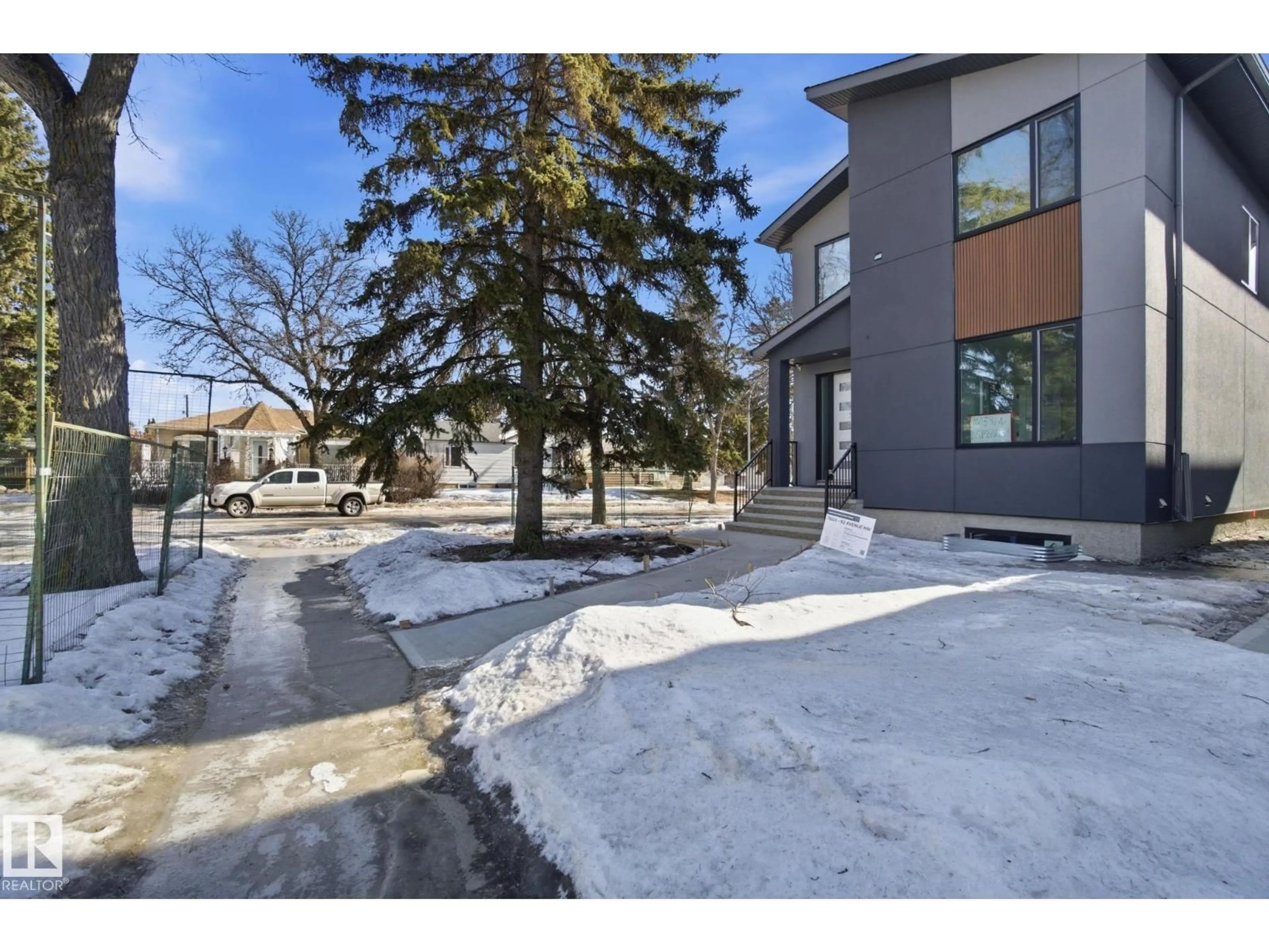 A pic from outside/outdoor area/front of a property/back of a property/a pic from drone, street for 7603 92 AV, Edmonton Alberta T6C1R3