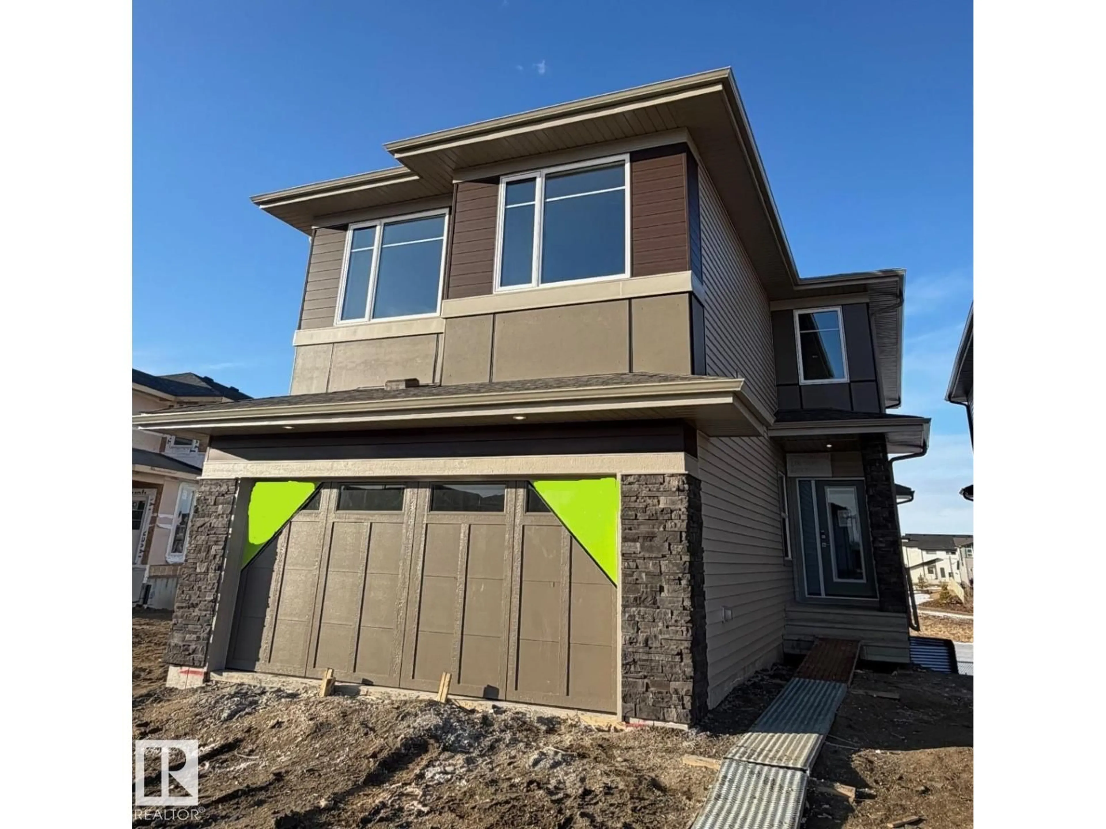 Home with vinyl exterior material, street for 2334 EGRET WY, Edmonton Alberta T6M3G8