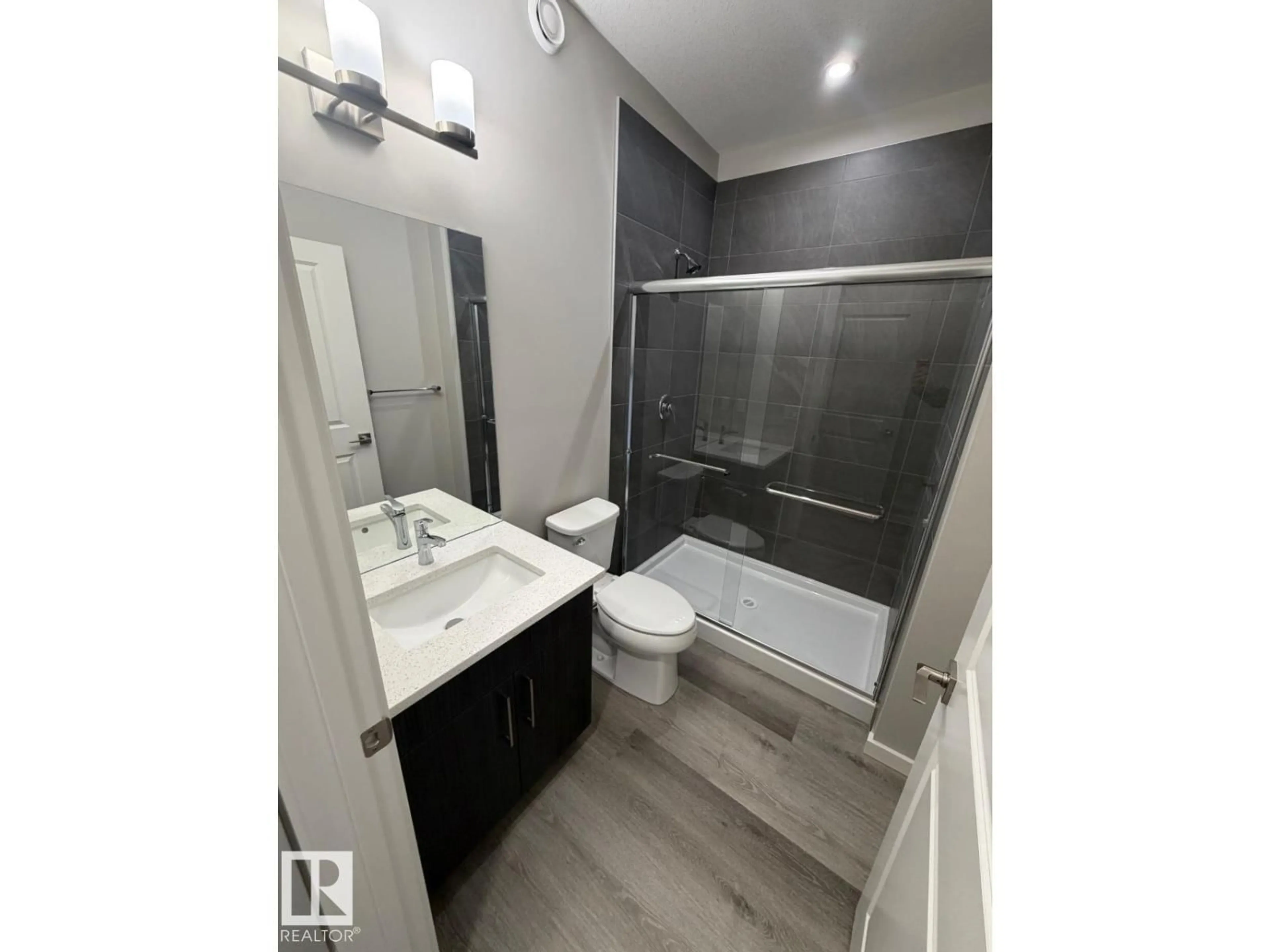 Standard bathroom, ceramic/tile floor for 2334 EGRET WY, Edmonton Alberta T6M3G8