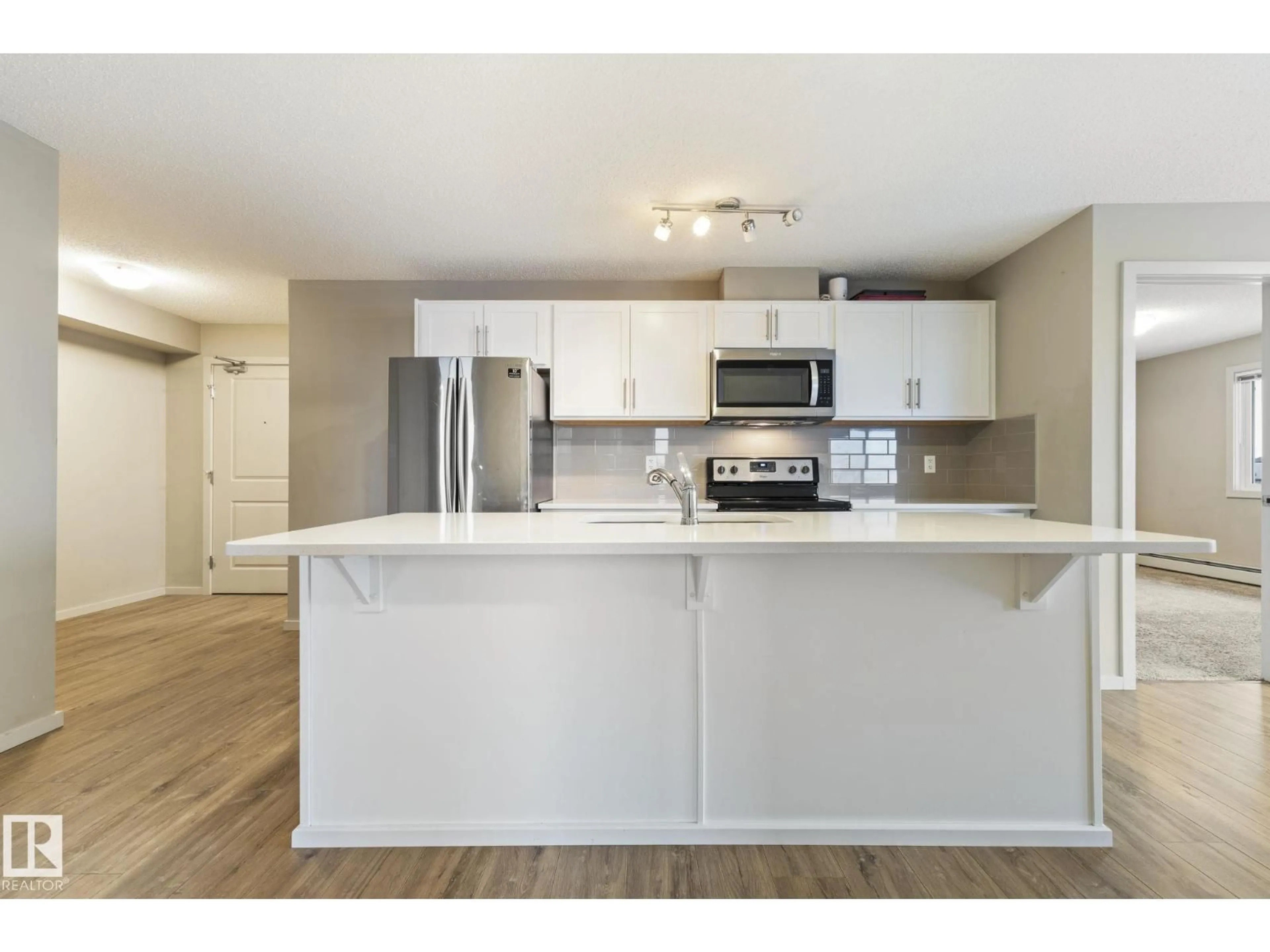 Open concept kitchen, unknown for 420 - 5404 7 AV SW, Edmonton Alberta T6X2K4